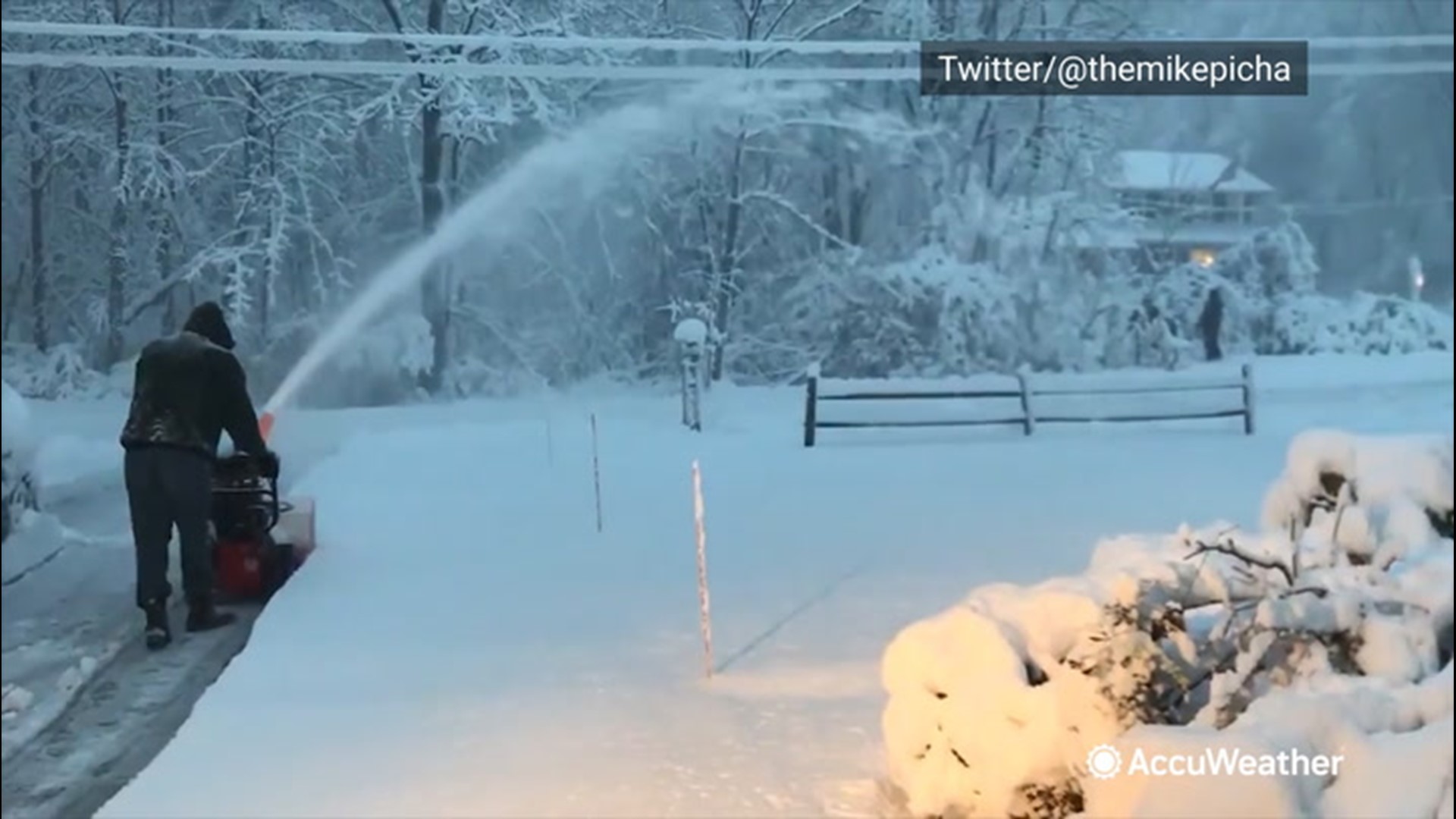 Residents used snow blowers to clear snow in Geauga County, Ohio, on Dec. 1, as a winter storm swept through the area, dropping several inches of snow.