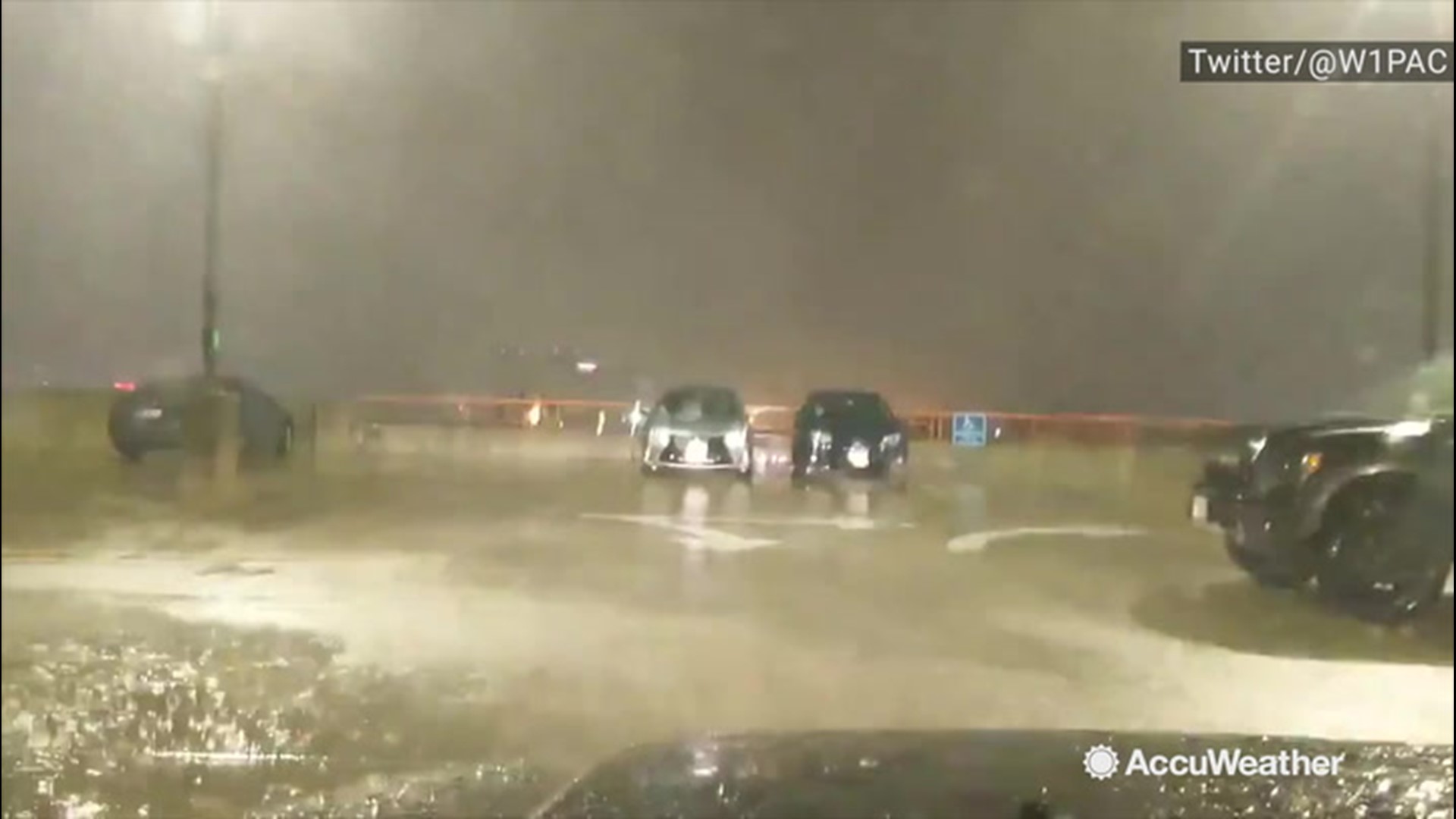 Late-night rain on Oct. 16 pummeled Logan International Airport in Boston, Massachusetts, flooding the parking lots.
