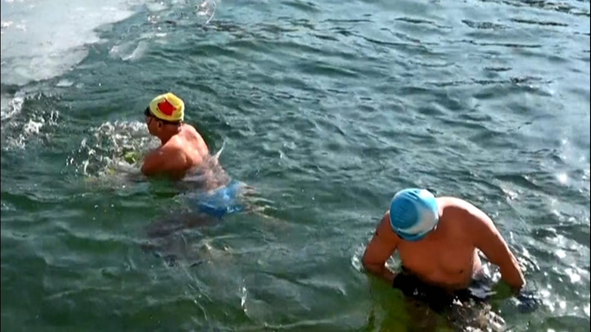 Temperatures were as low as 12 degrees Fahrenheit in Beijing, China, but that didn't stop these swimmers from jumping straight into the ice-cold waters on Jan. 6.