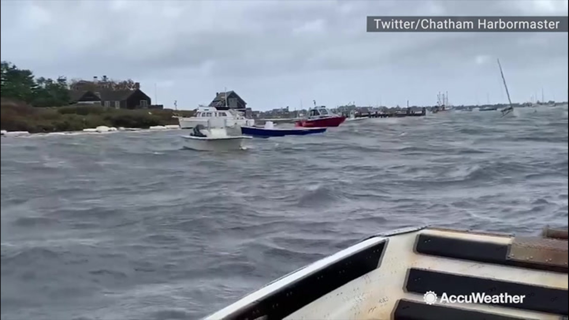 Rough waters pounded boats in Stage Harbor near Chatham, Massachusetts, Thursday as fierce winds from a bomb cyclone lashed the region.