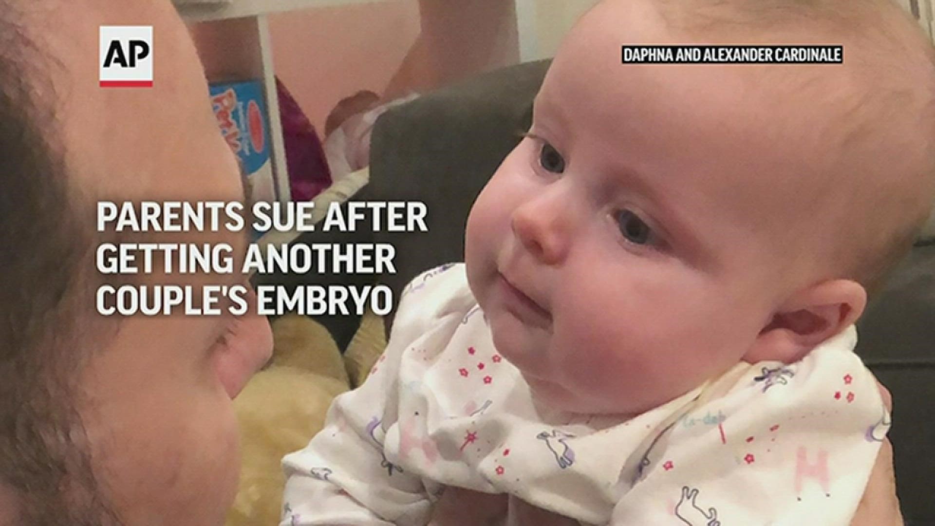 Two California couples gave birth to each others' babies after a mix-up at a fertility clinic and spent months raising children that weren't theirs, a lawsuit says.