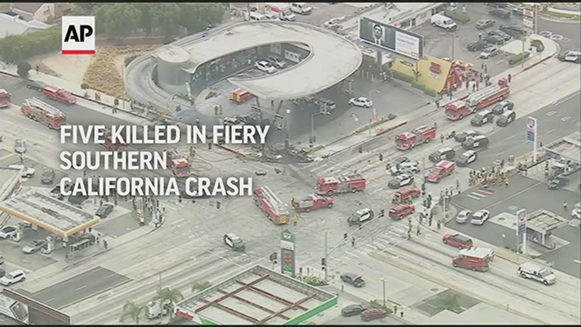 A pregnant woman and an infant were among the people killed when a speeding car flew through a red light at a busy intersection.