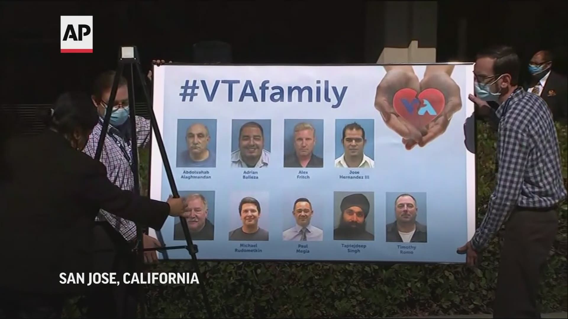 Santa Clara County Valley Transportation Authority board members choked up as they spoke before a large sign with photos of the nine victims killed in the shooting.