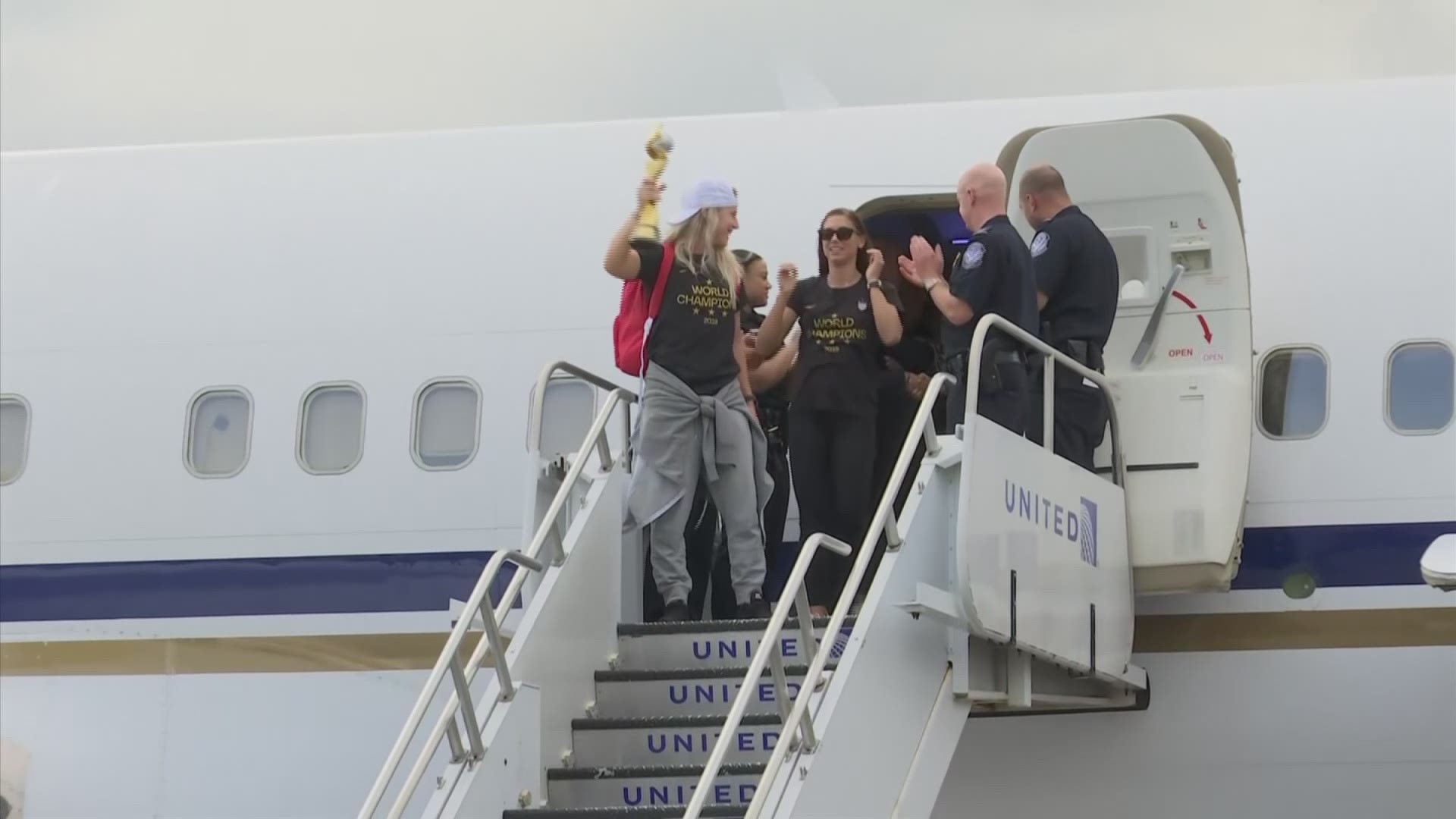 The U.S. women's national team arrived in New York on Monday, a day after beating the Netherlands 2-0 to capture a record fourth Women's World Cup title. (AP)