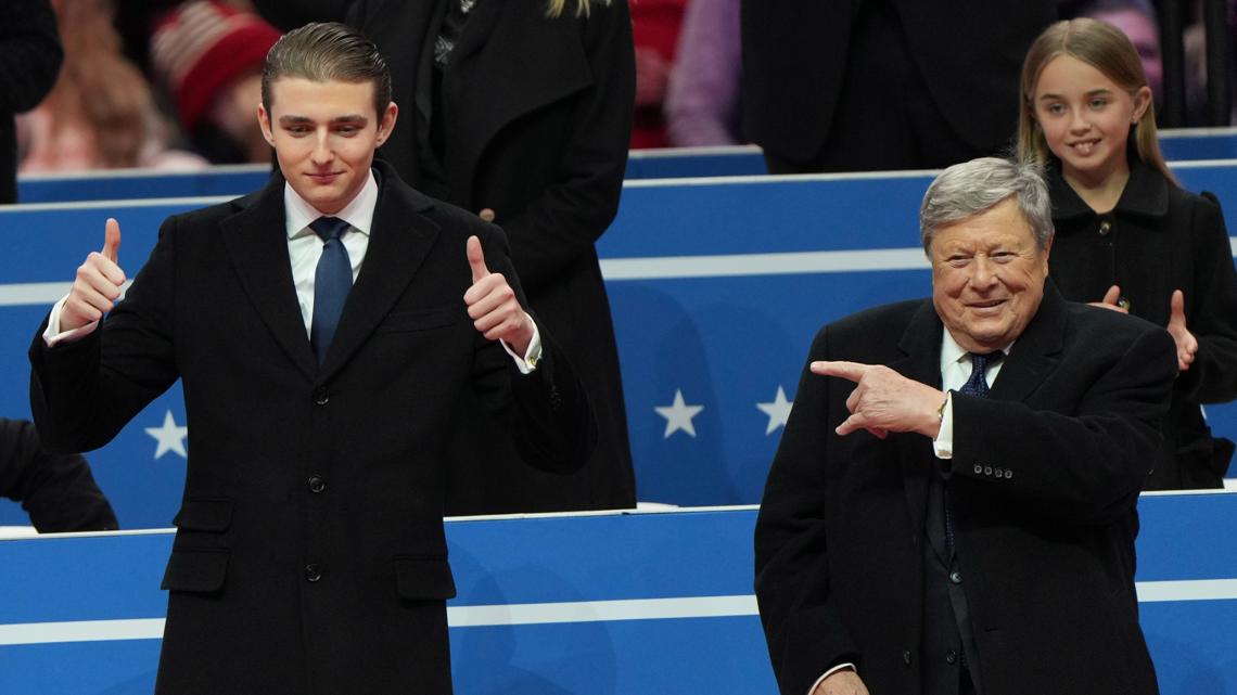 Who is the man sitting next to Barron Trump at the inauguration? | abc10.com