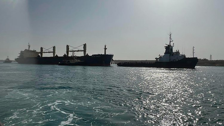 Ship refloated after running aground in Suez Canal, stalling shipping traffic