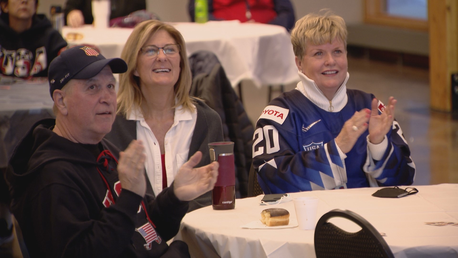 The community organized a watch party for Greg and Robin Brandt so they could cheer on their daughter Hannah and the rest of the USA Women's Hockey Team.