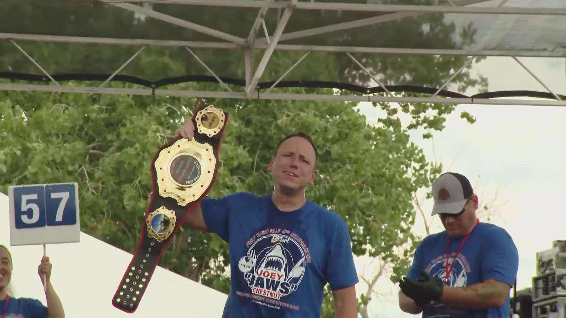 Joey Chestnut eats 57 hot dogs in five minutes same day Nathan's champion ate 58 in 10 minutes