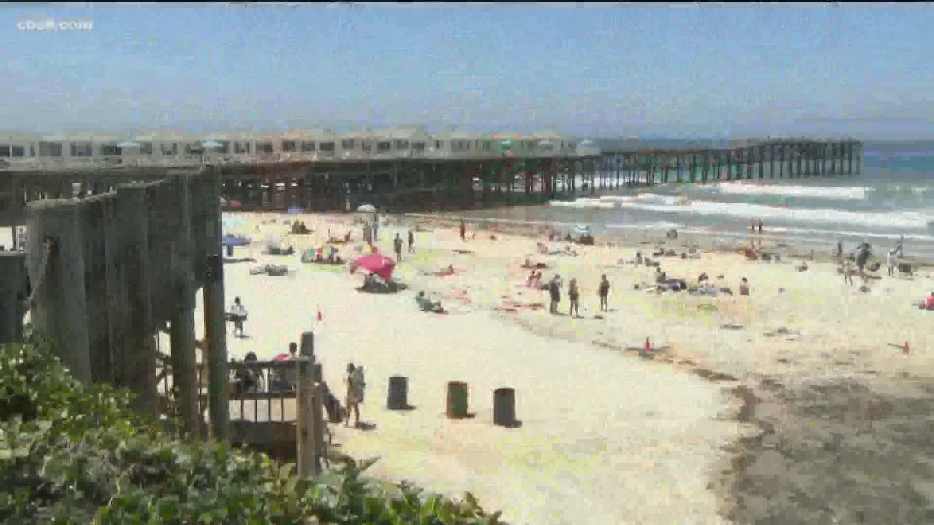 It was also announced late Friday that the cities of Carlsbad and Oceanside would be closing their beach parking lots to try and keep the crowd sizes down.