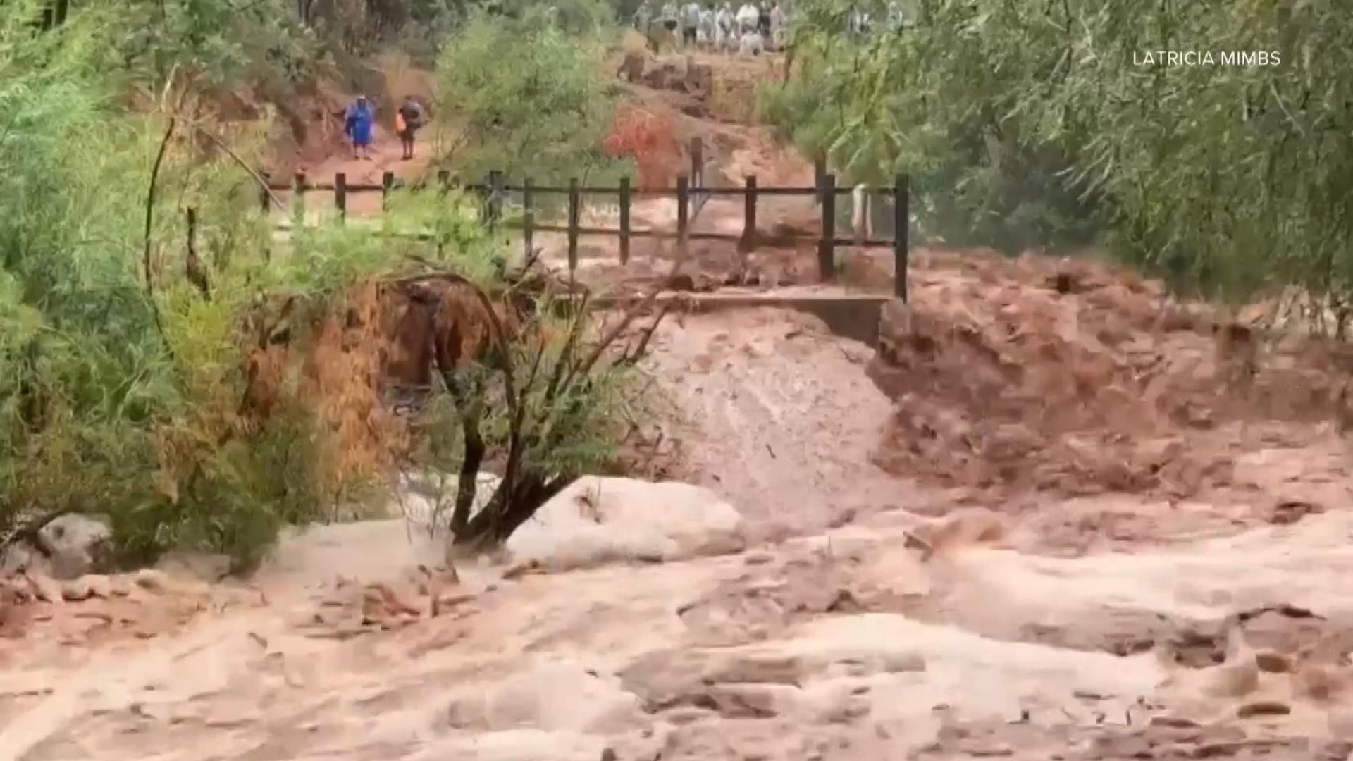 Crews are continuing to search for a missing Gilbert as the Arizona National Guard rescued more than 100 people. Watch the video above for more information.