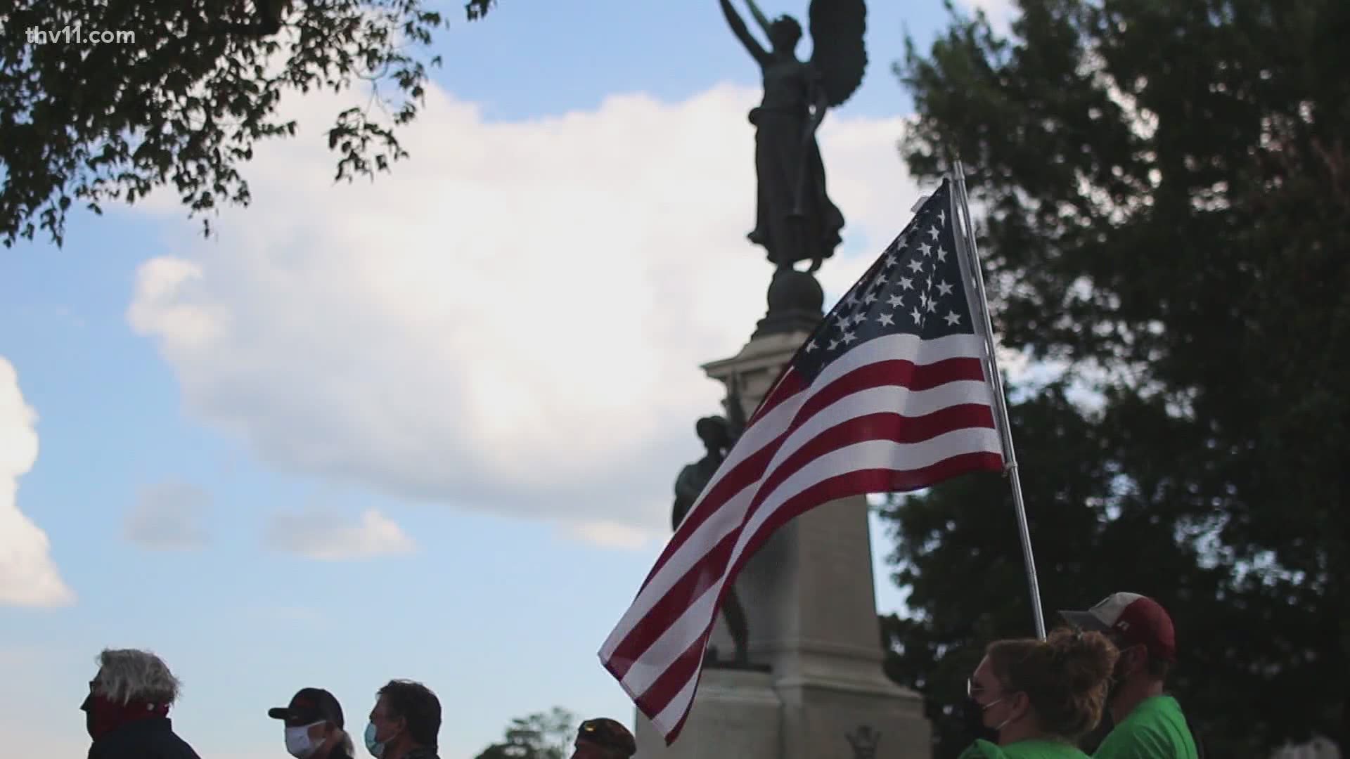 After calls on social media to take down the Confederate statue, dozens show up to protect it.