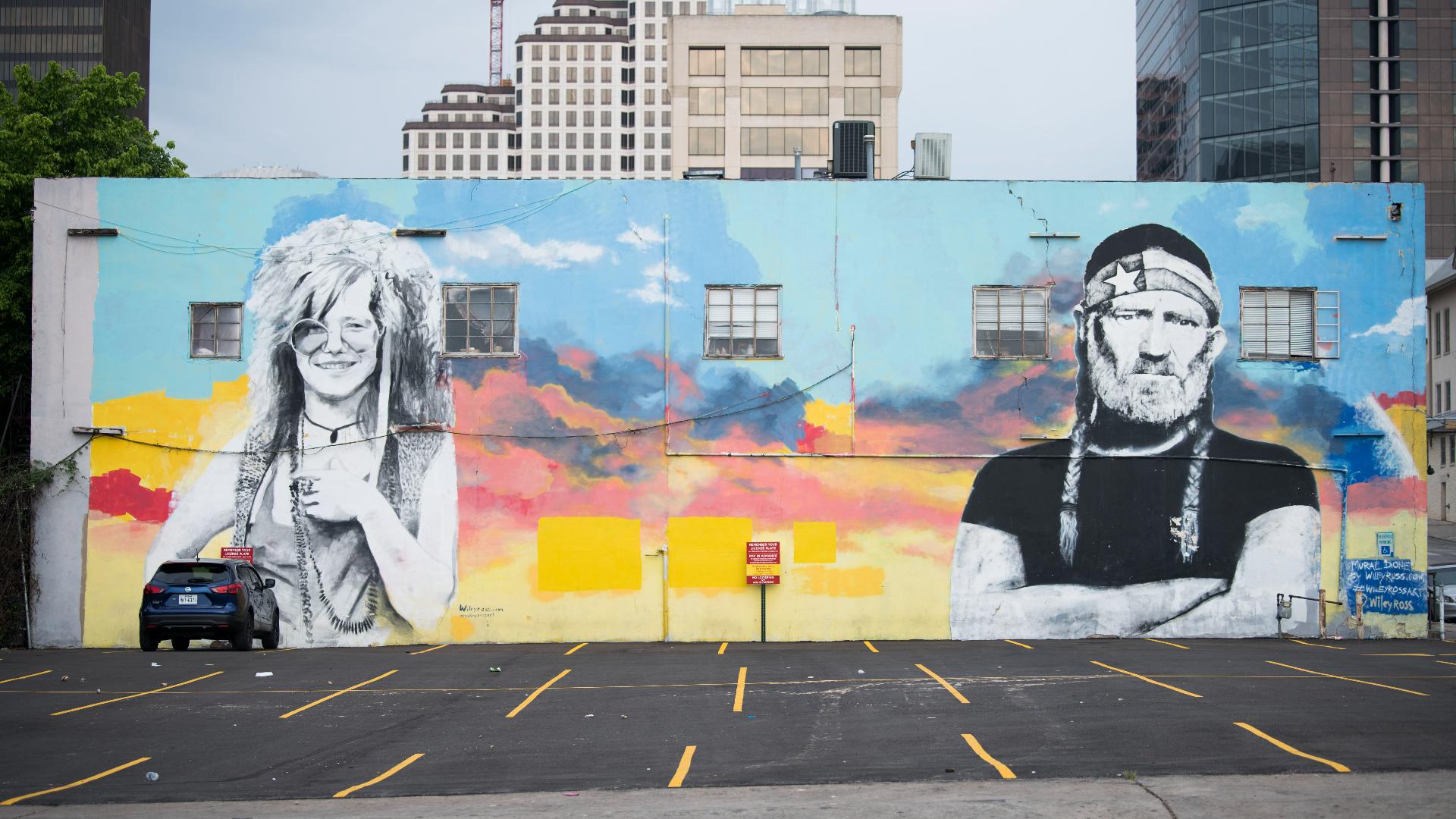 The mural is on the side of a nearly 100-year-old building on Seventh Street, near Neches Street, where Mug Shots was previously located.