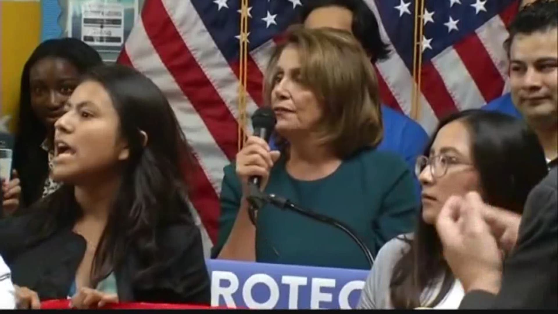 Today, House Minority Leader Nancy Pelosi planned to announce her support for the DREAM Act, which could eventually give Dreamers permanent residency. That's when DACA protesters arrived.