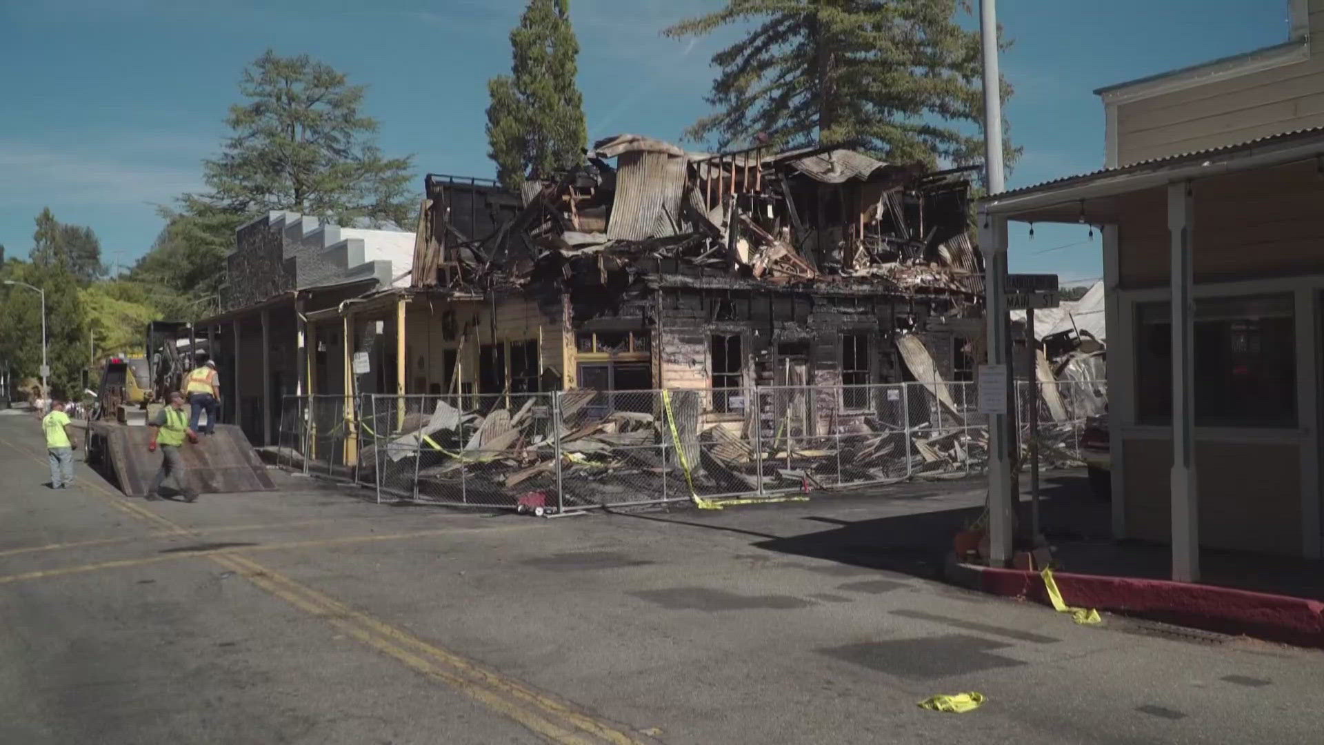 The owner of the building says a woman who was living on the second floor of the building was alerted by her dog and woke up just in time to escape