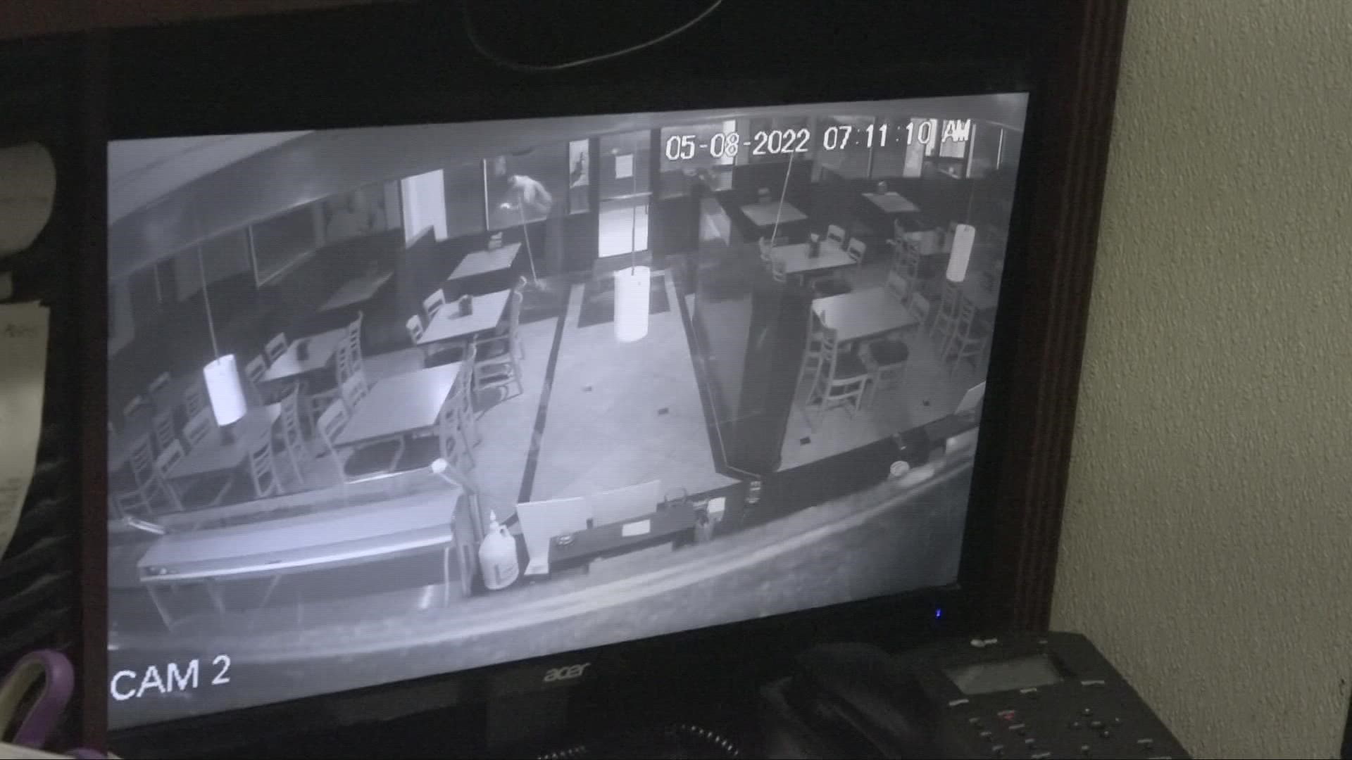 Surveillance footage from May 8 shows a person walking in front of the restaurant, smashing nearly every window at Citrus Heights Mountain Mike's.