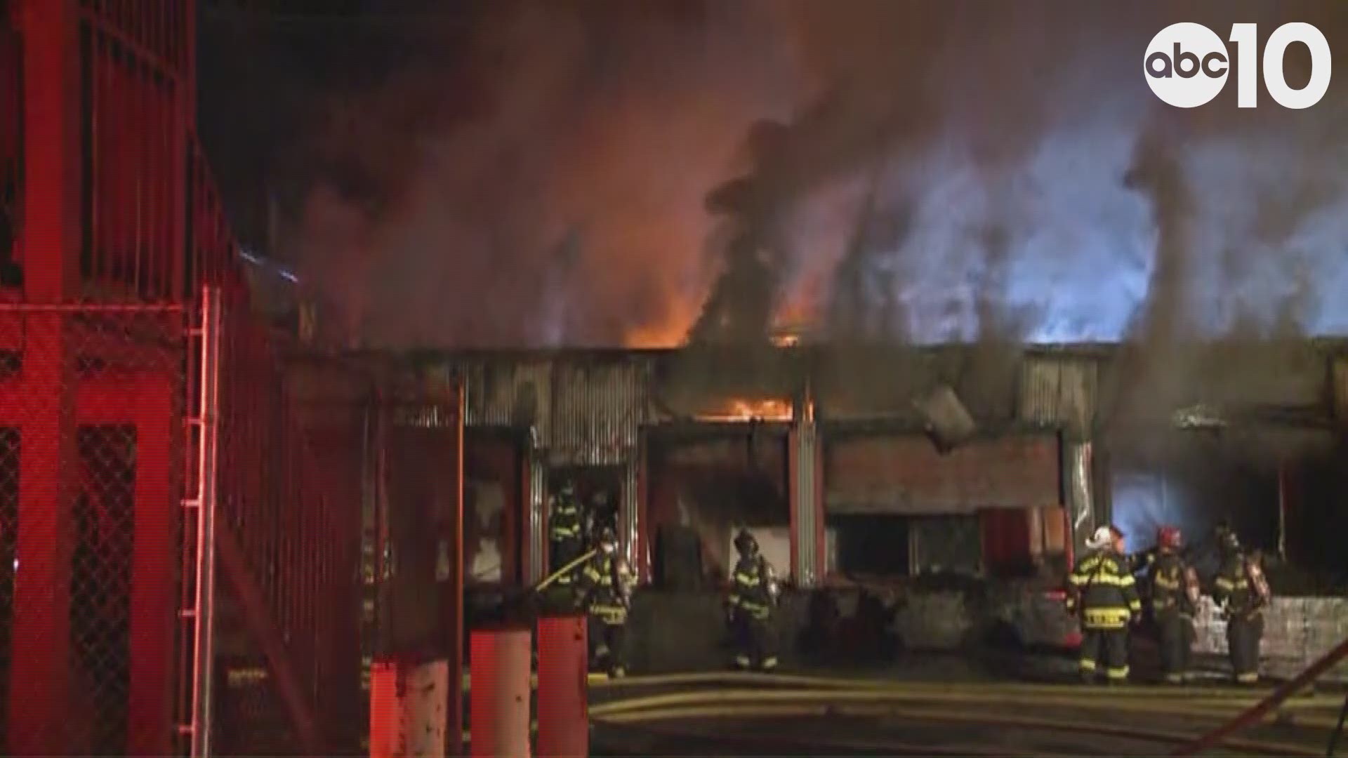 More than 100 fire fighters are working to suppress a four-alarm building fire early Thursday morning in an industrial area of downtown Sacramento.