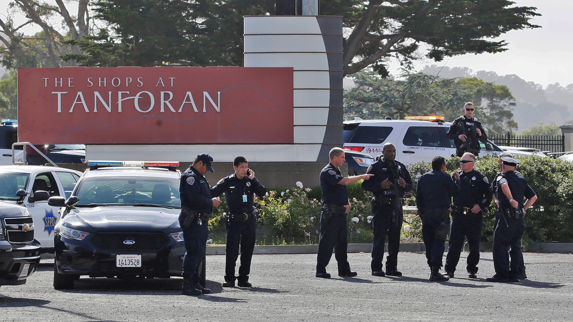 A shooting that caused panic at a mall near San Francisco left two teens with serious gunshot wounds and led to transit delays during rush hour Tuesday as police stopped a train to search for two suspects, authorities said.