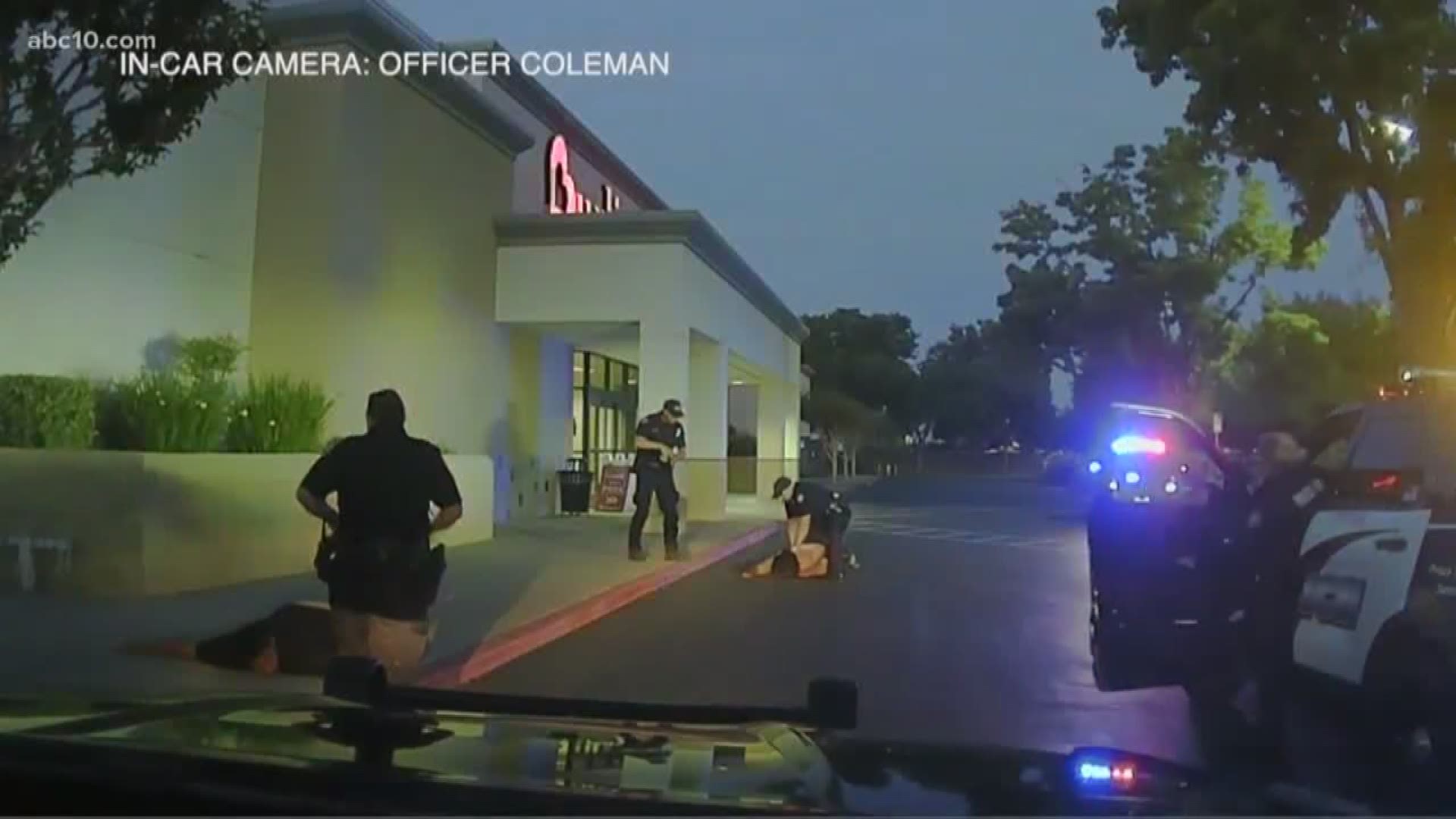 Police dash cam video shows an officer kicking a person in the head.