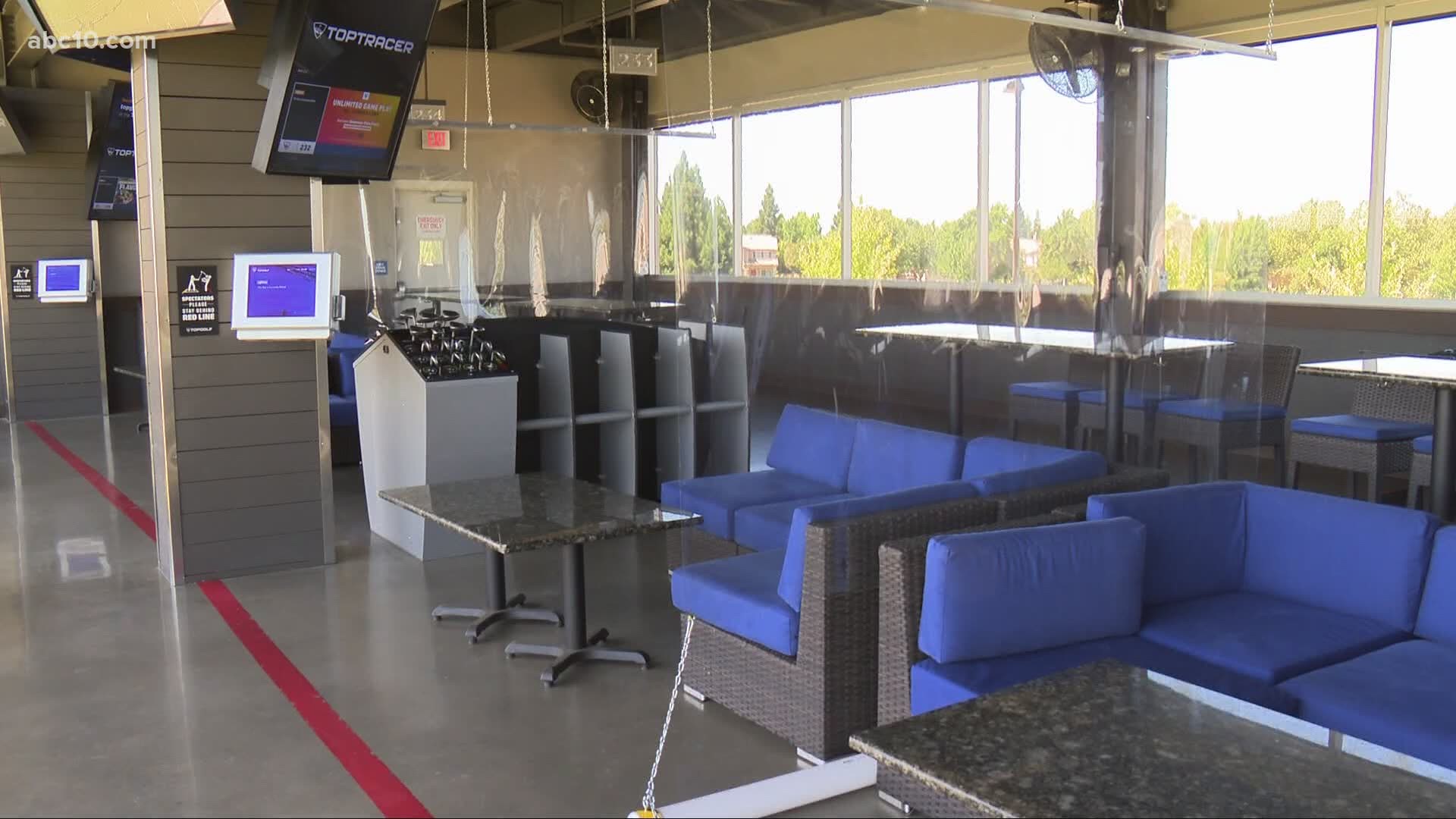 Recreational business like Topgolf and Smart Axe are reopening with changes in place to encourage social distancing.