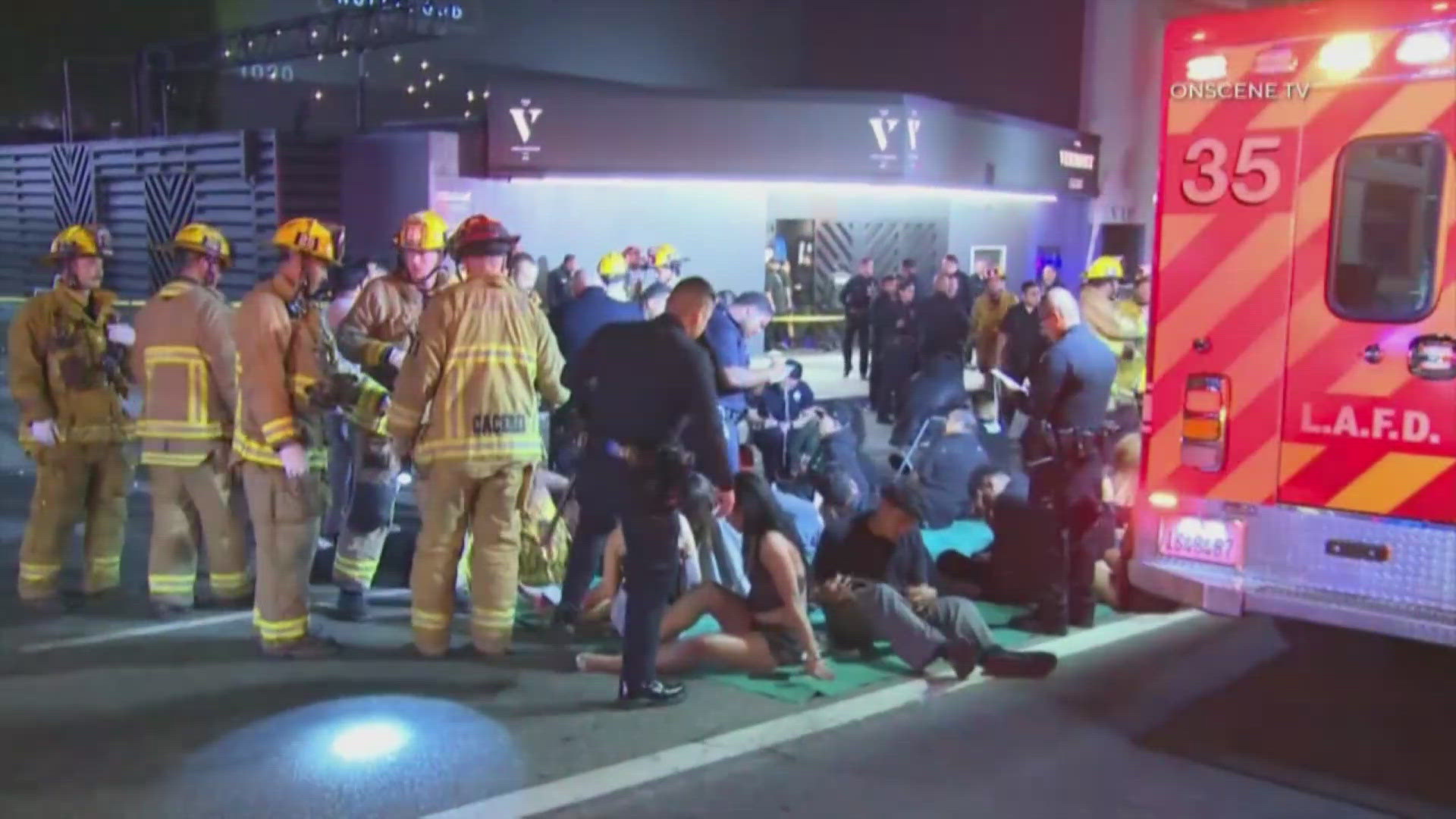 Dozens of people were injured early Saturday after a car drove into a crowd outside.