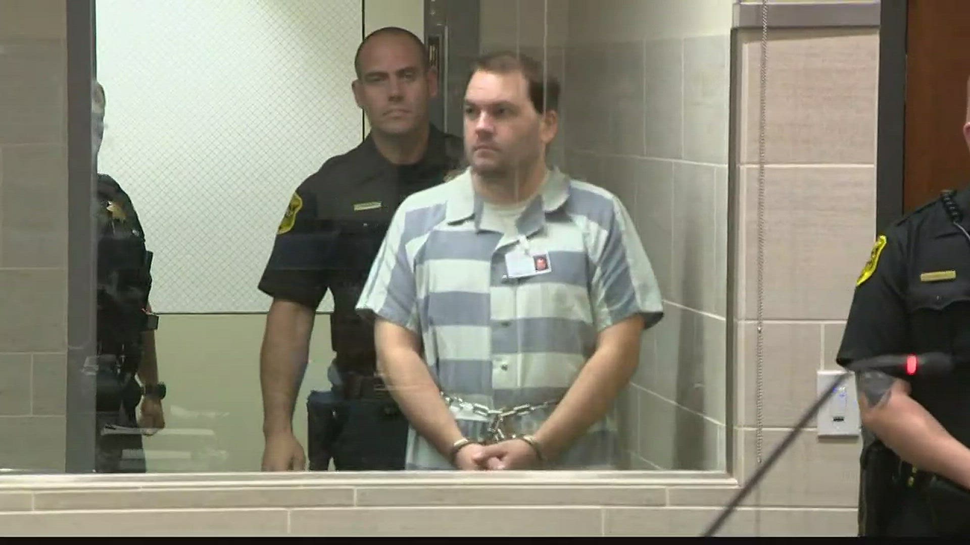 A father accused of killing his three children had only one-word answers to offer during his arraignment Monday afternoon.