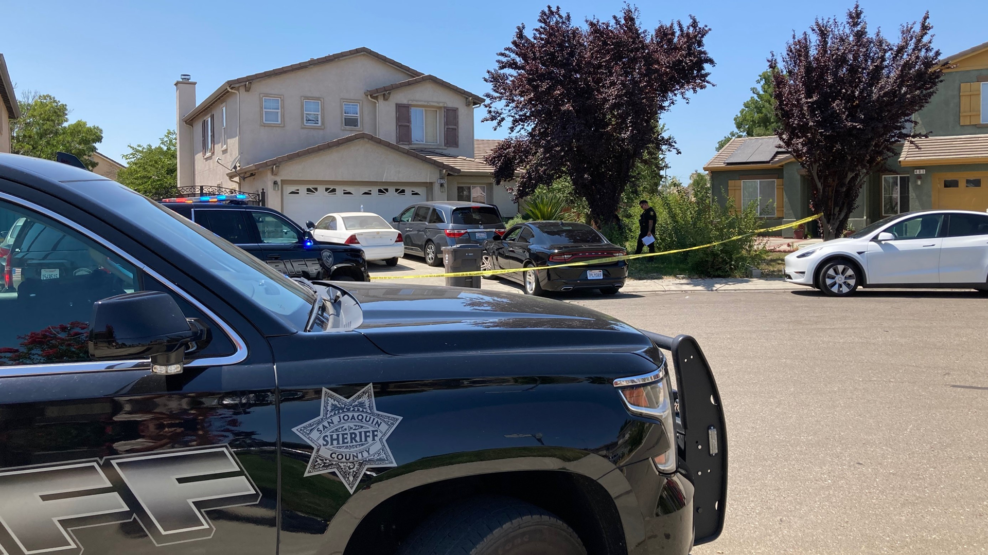 A suspect is in custody in connection to a deadly shooting at a home in Lathrop that was followed by a pair of carjackings and a manhunt.