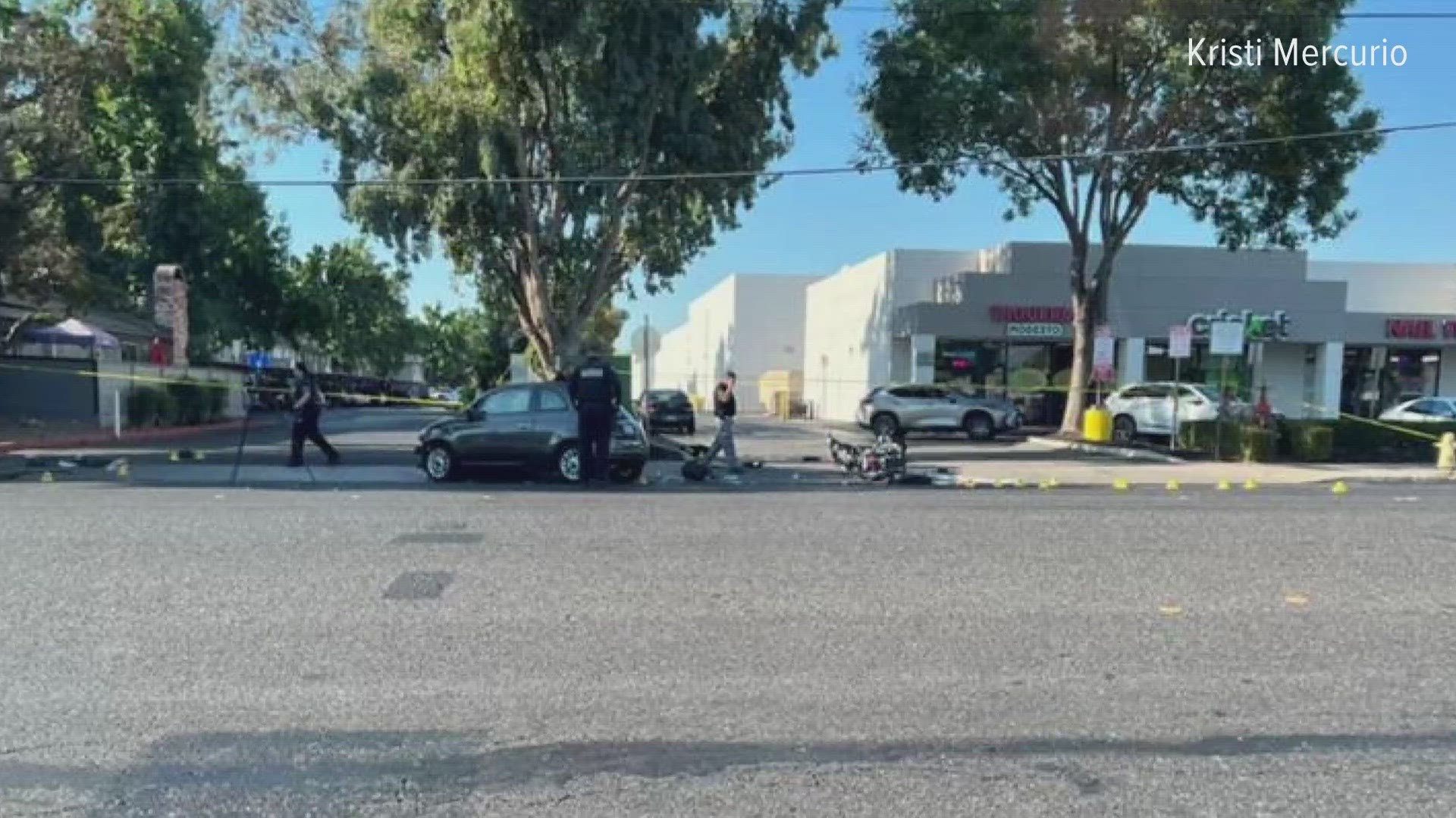 A man is in the hospital after being hit by a car while on a motorcycle in Modesto.