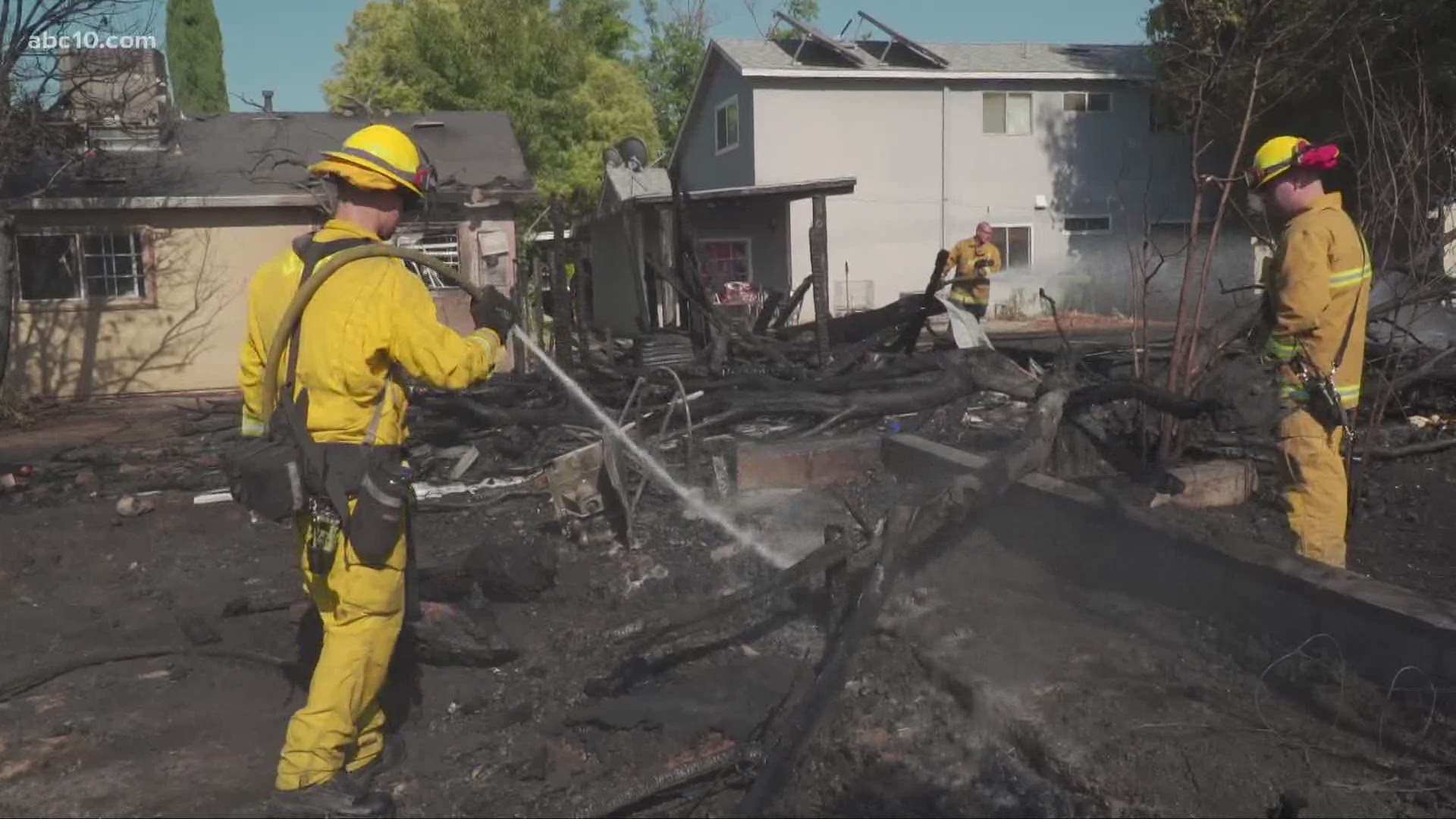 The small grass fire that damaged at least one home in Natomas was sparked by a firework, fire officials said.