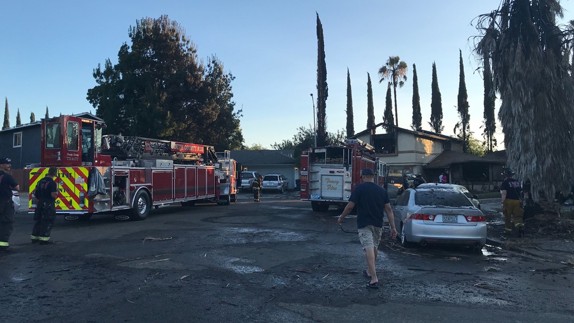 11 structures damaged after large fire tears through Tracy neighborhood