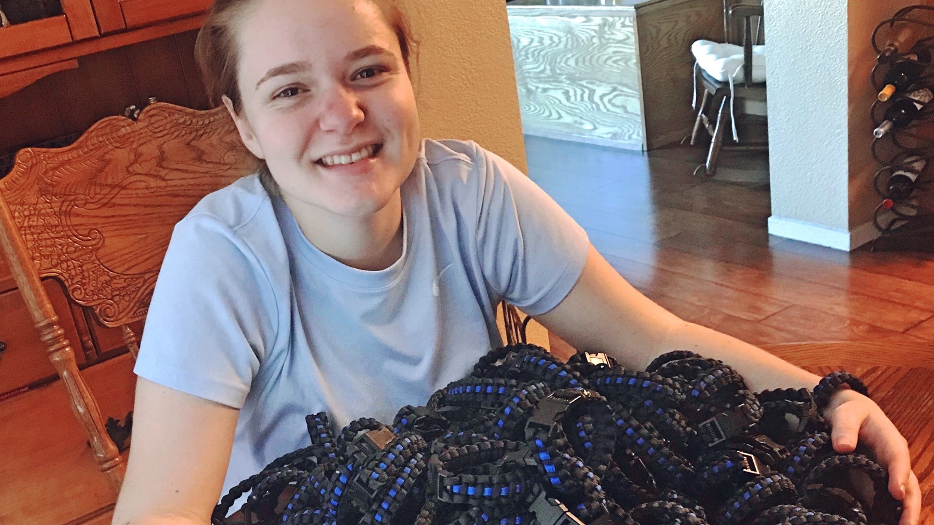 Kaitlyn Riley carries blue line bracelets everywhere she goes. She hopes others will follow her example and help show law enforcement that they are appreciated.