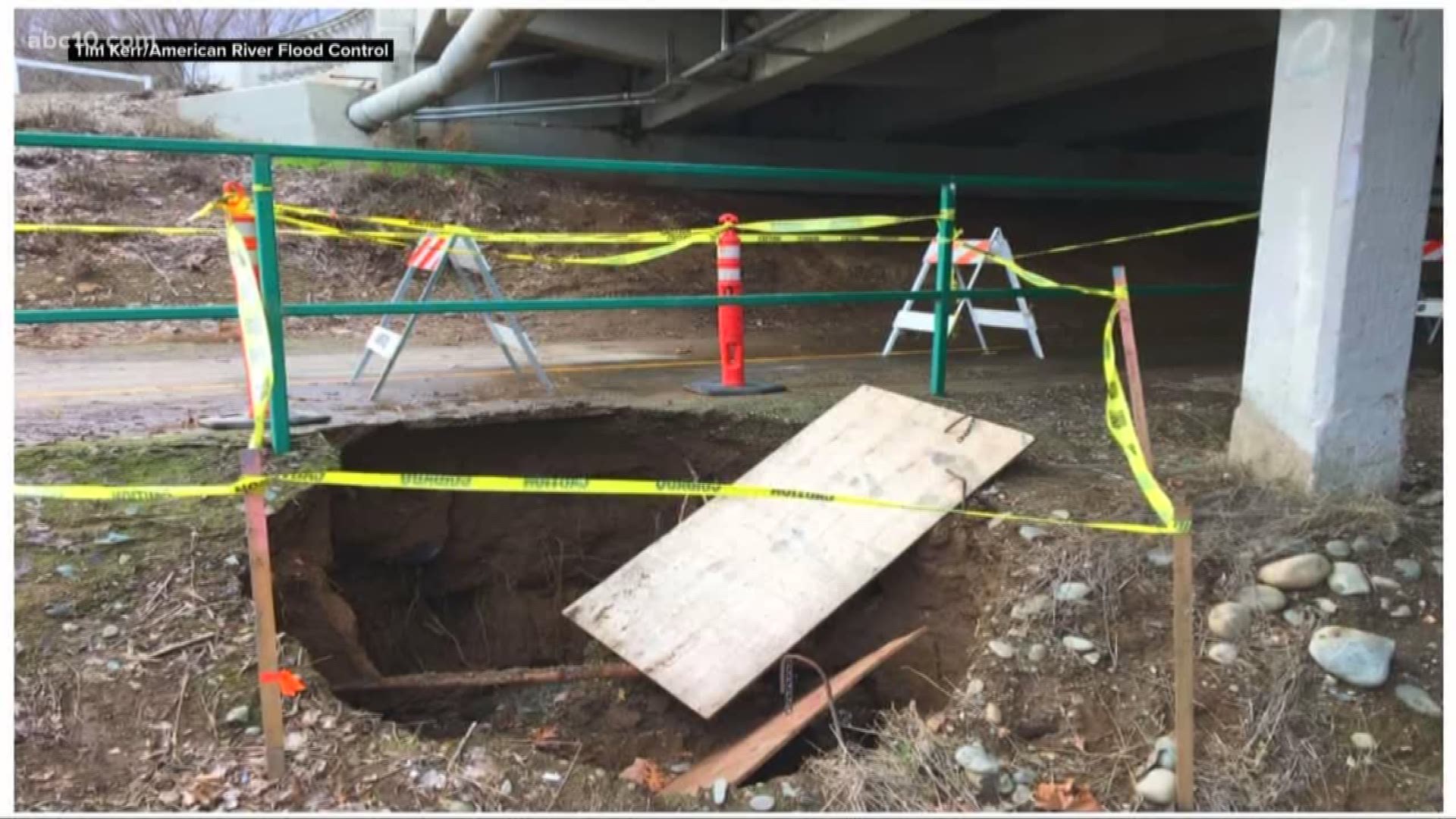 An 8-foot-deep sinkhole opened up earlier Wednesday near the American River. It opened up opened up under the H Street Bridge near Sacramento State.