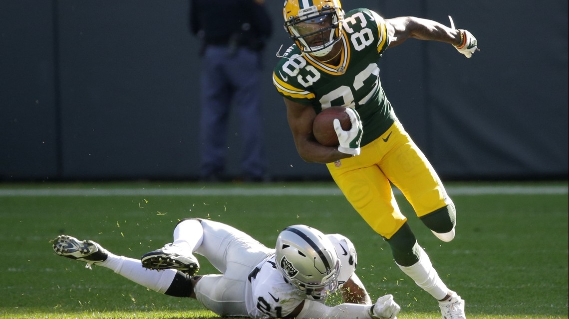 Rodgers throws 5 TD passes, Packers gash Raiders 42-24