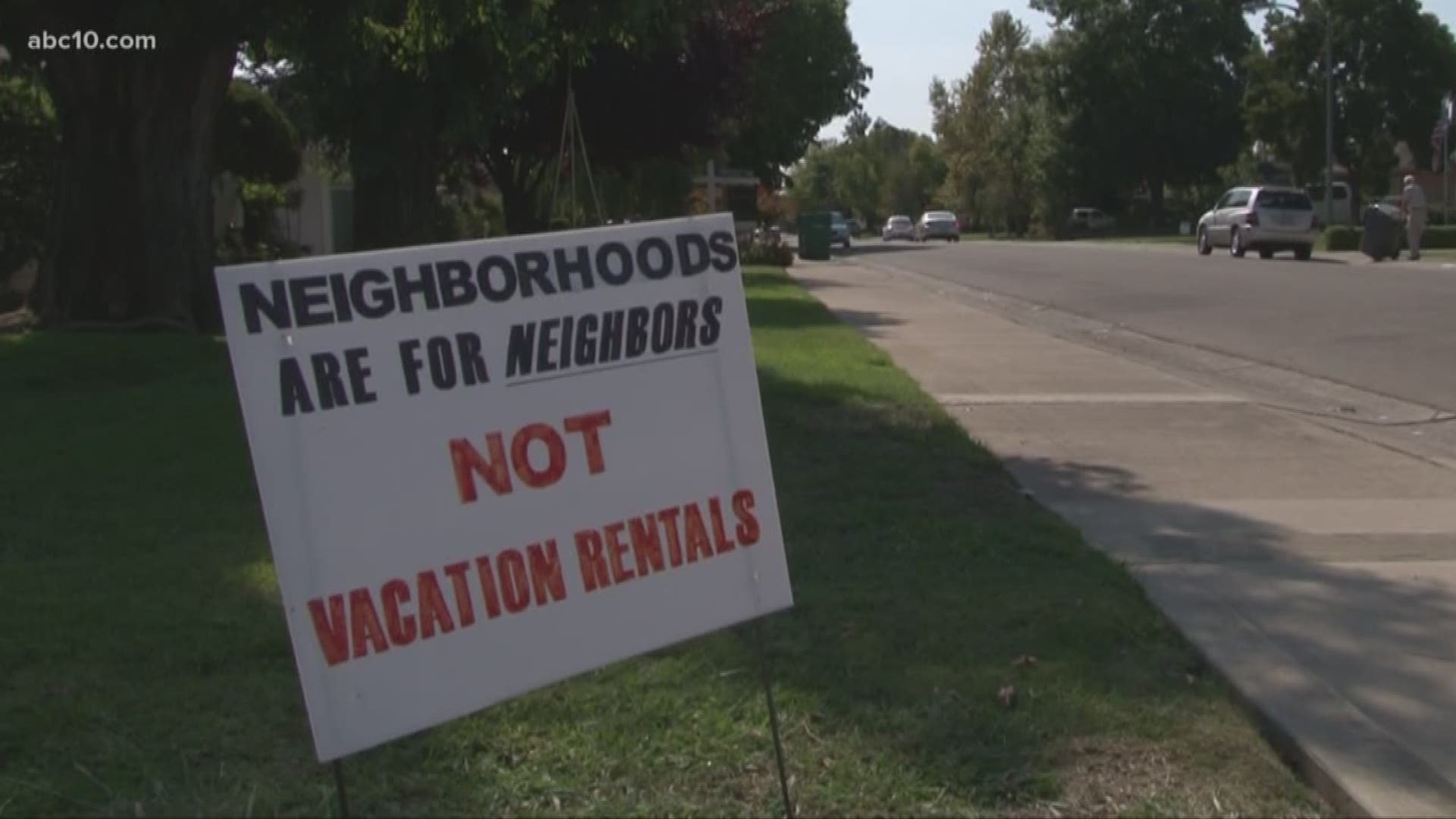There are signs in front yards that read "Neighborhoods are for neighbors, not vacation rentals."