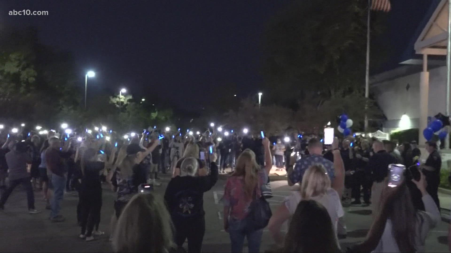 Community members gathered in front of the Galt Police Department Monday, to rally behind two police officers who were seriously injured during an on-duty crash.