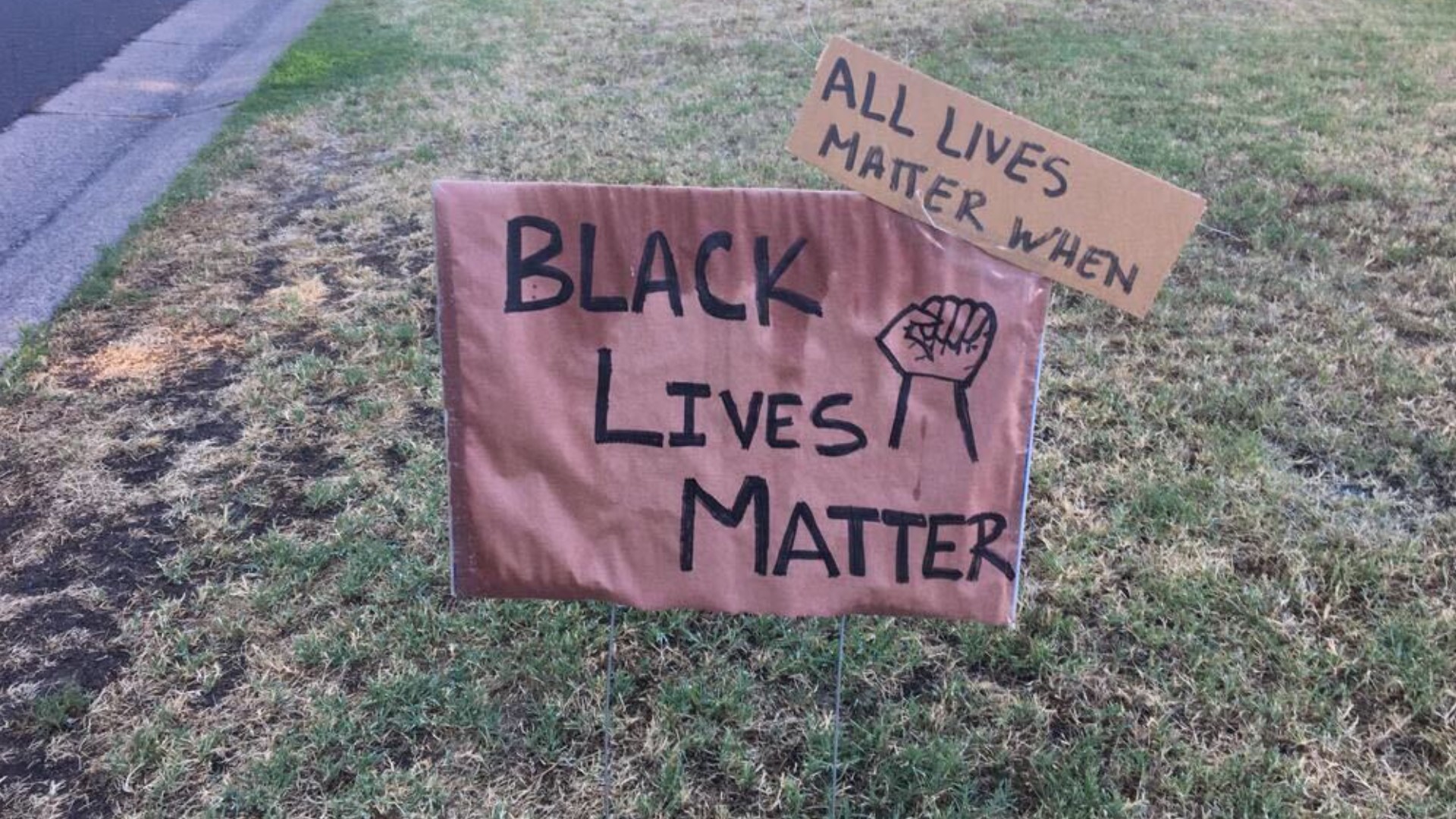 A Sacramento mother's sign showing the phrase "Black Lives Matter" was defaced with an "All Lives Matter" sign.