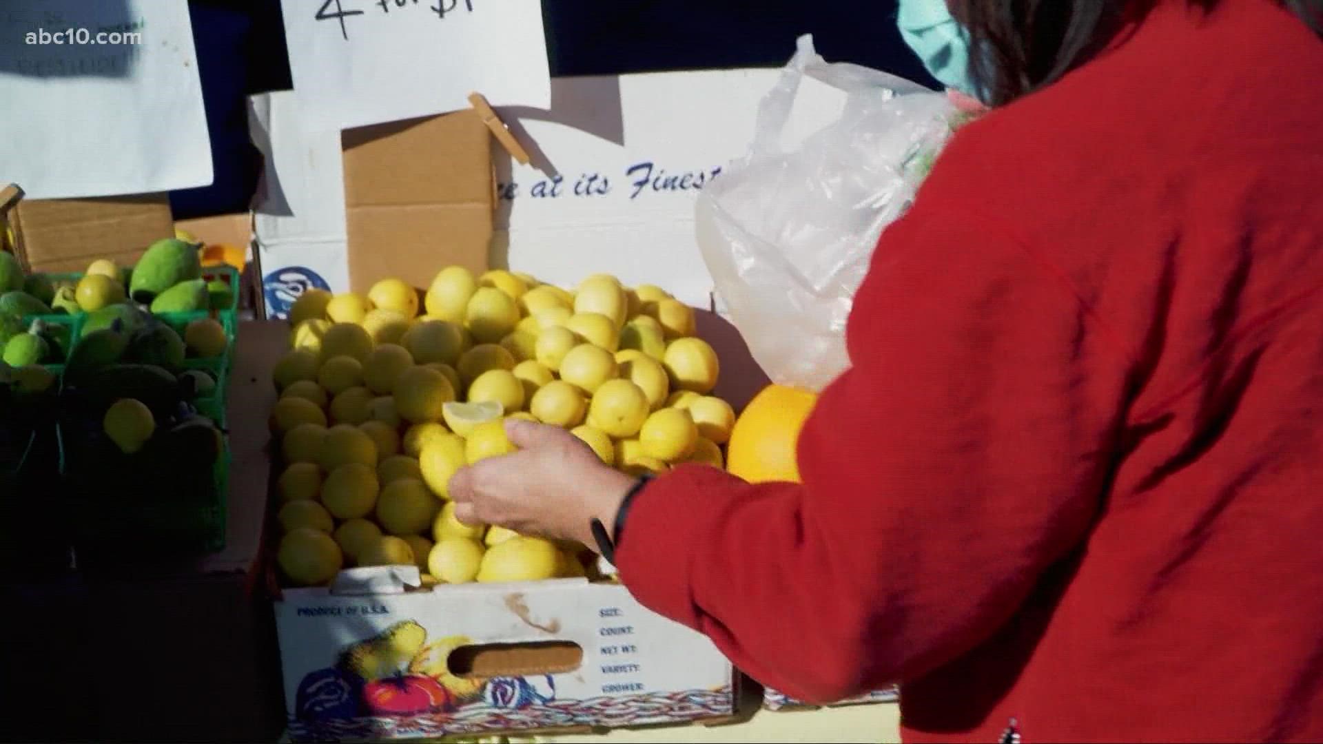 The temporary home for the Sacramento farmers market at the Arden Fair Mall parking lot will be around a little longer.