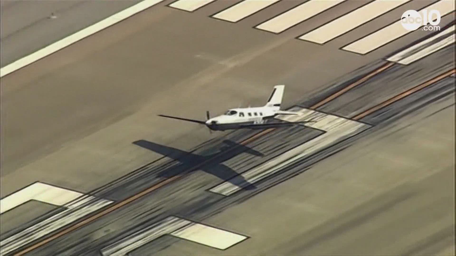 ABC10 affiliate KGO recorded as a small plane successfully landed on its belly at Mineta San Jose Airport after its landing gear failed.