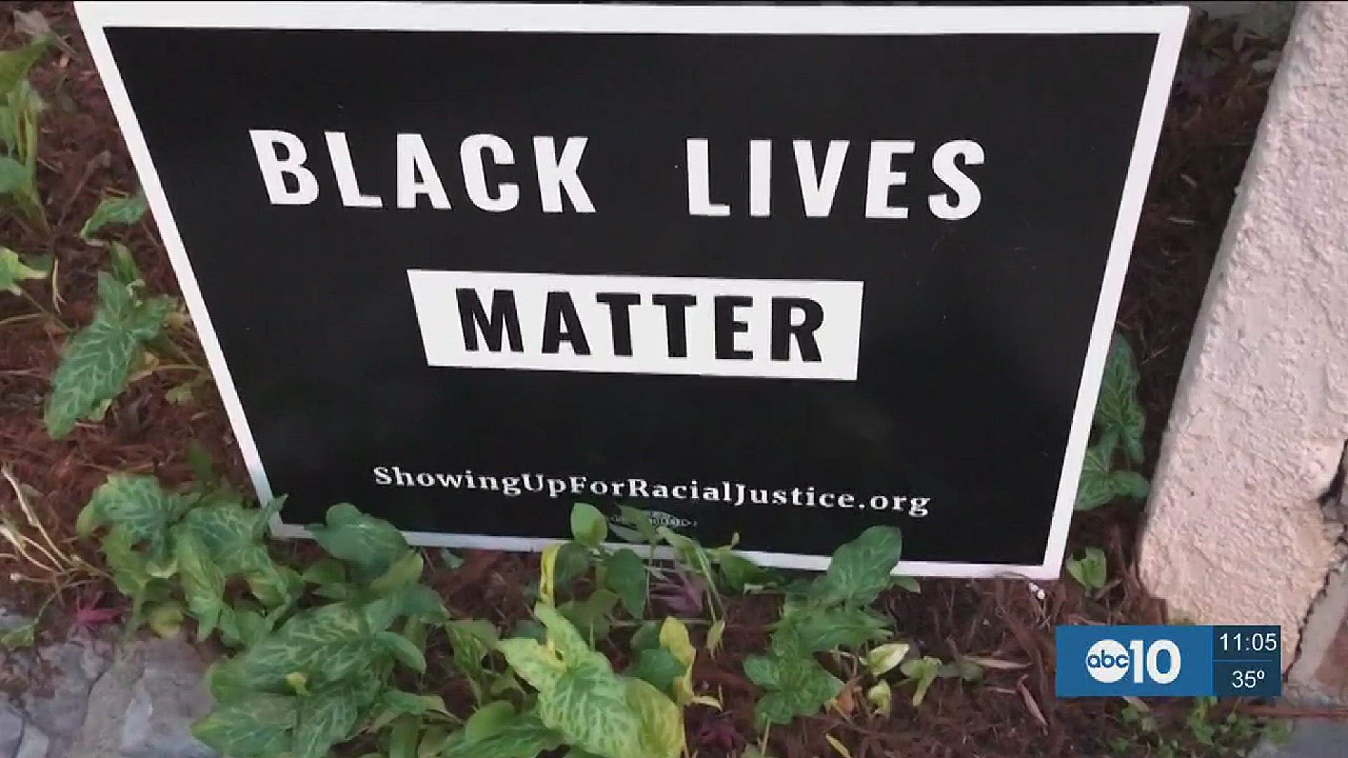A woman who has put Black Lives Matter signs in her front yard says she won't back down after vandalism. (Dec. 19, 2016)