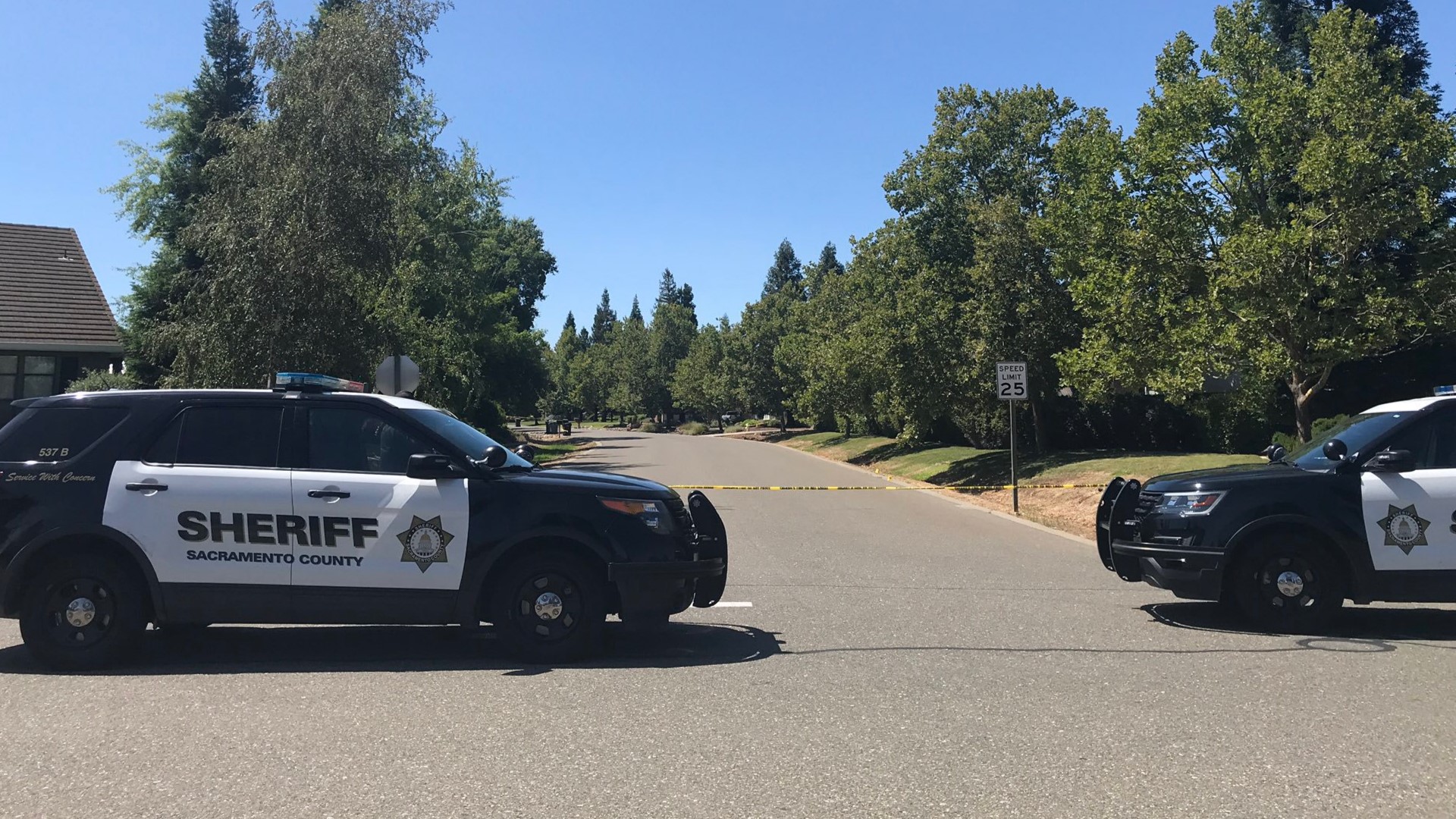 Neighbors in the quiet area of well-manicured homes say it's unusual to see a crime scene as authorities investigate the fatal shooting of an 18-year-old driver.