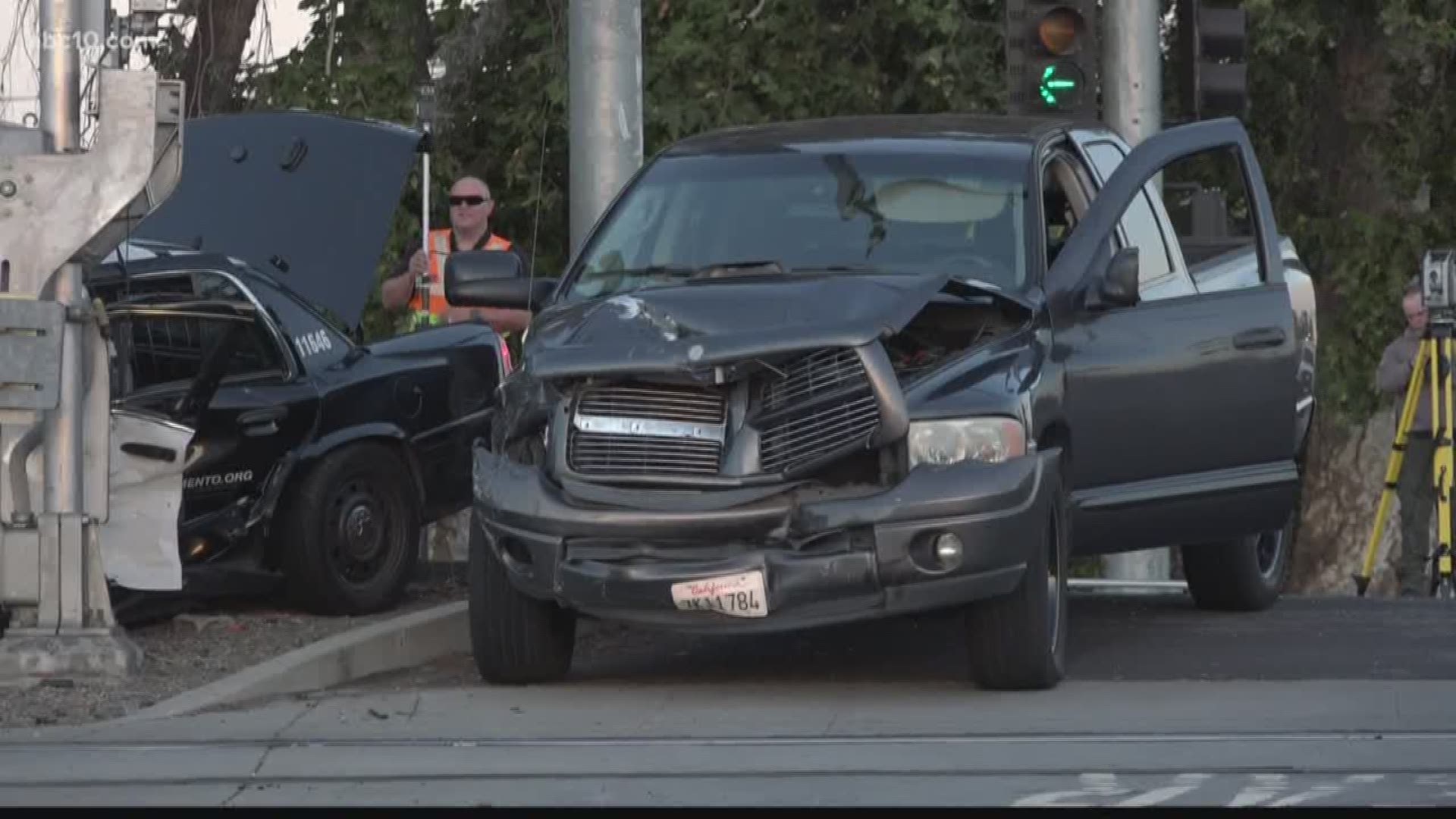 The officer was driving a patrol vehicle Westbound on Richards Boulevard when he collided with a gray Dodge pickup truck traveling Northbound on 16th Street.