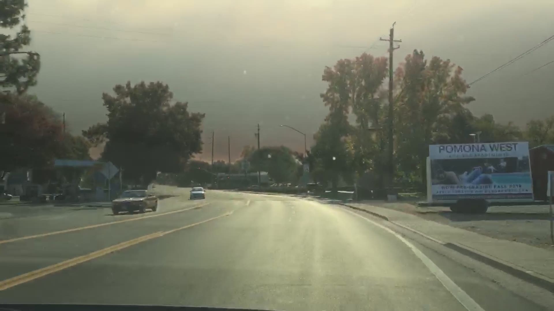 The smoke from the Camp Fire turns blue skies to gray as Monica Garcia heads into Paradise, CA.