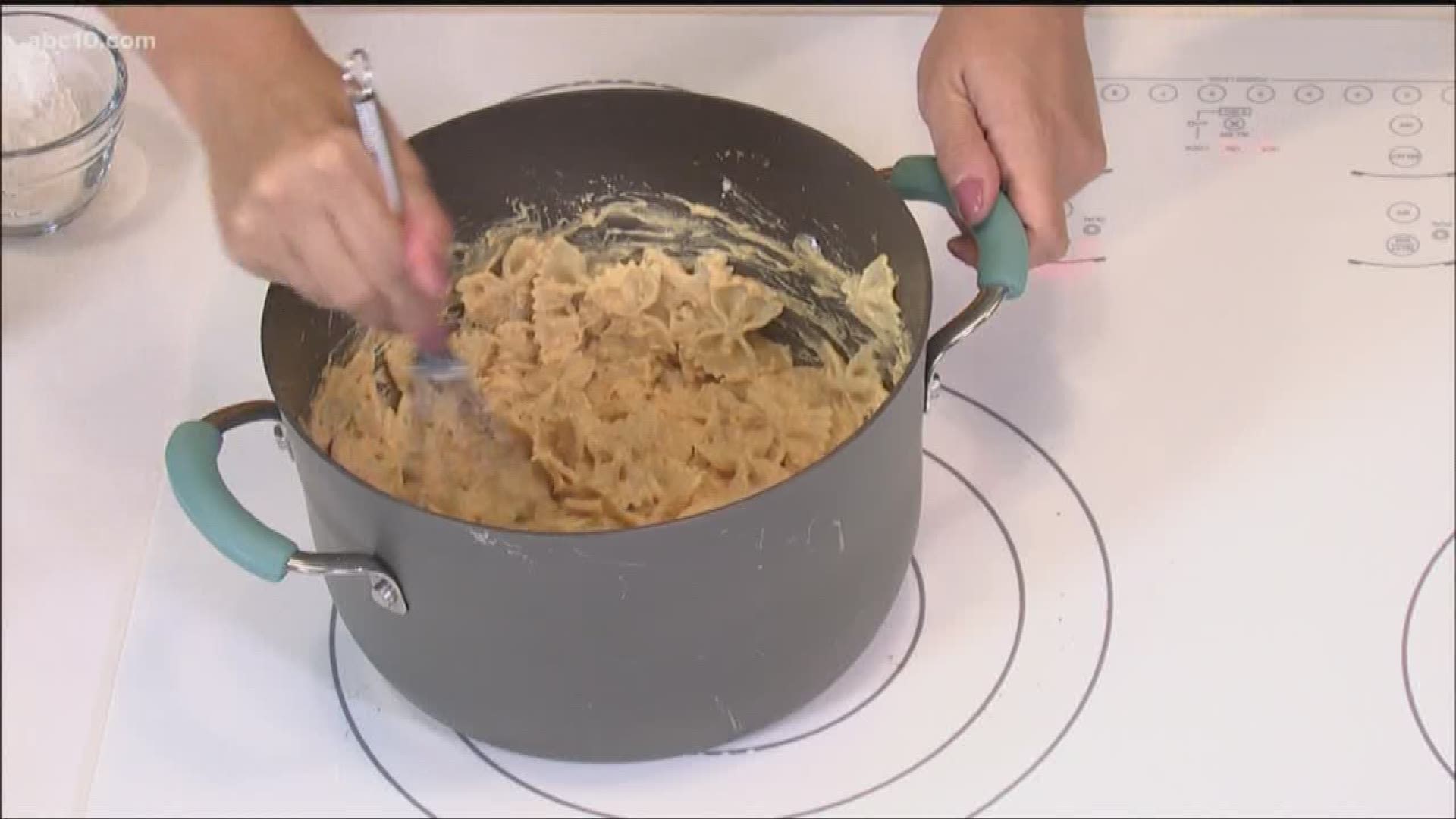 ABC 10's Carley Gomez shows Brittany Begley how to whip up a pumpkin alfredo.