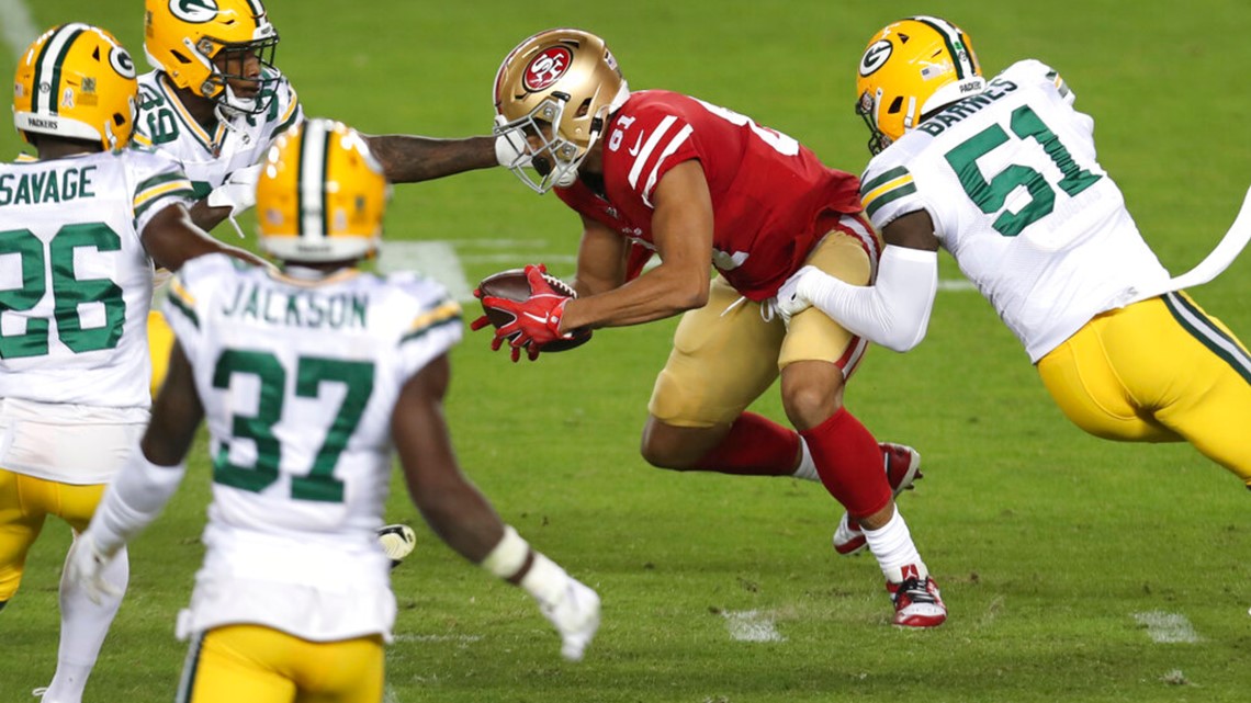 Aaron Rodgers leads Packers past undermanned 49ers, 34-17