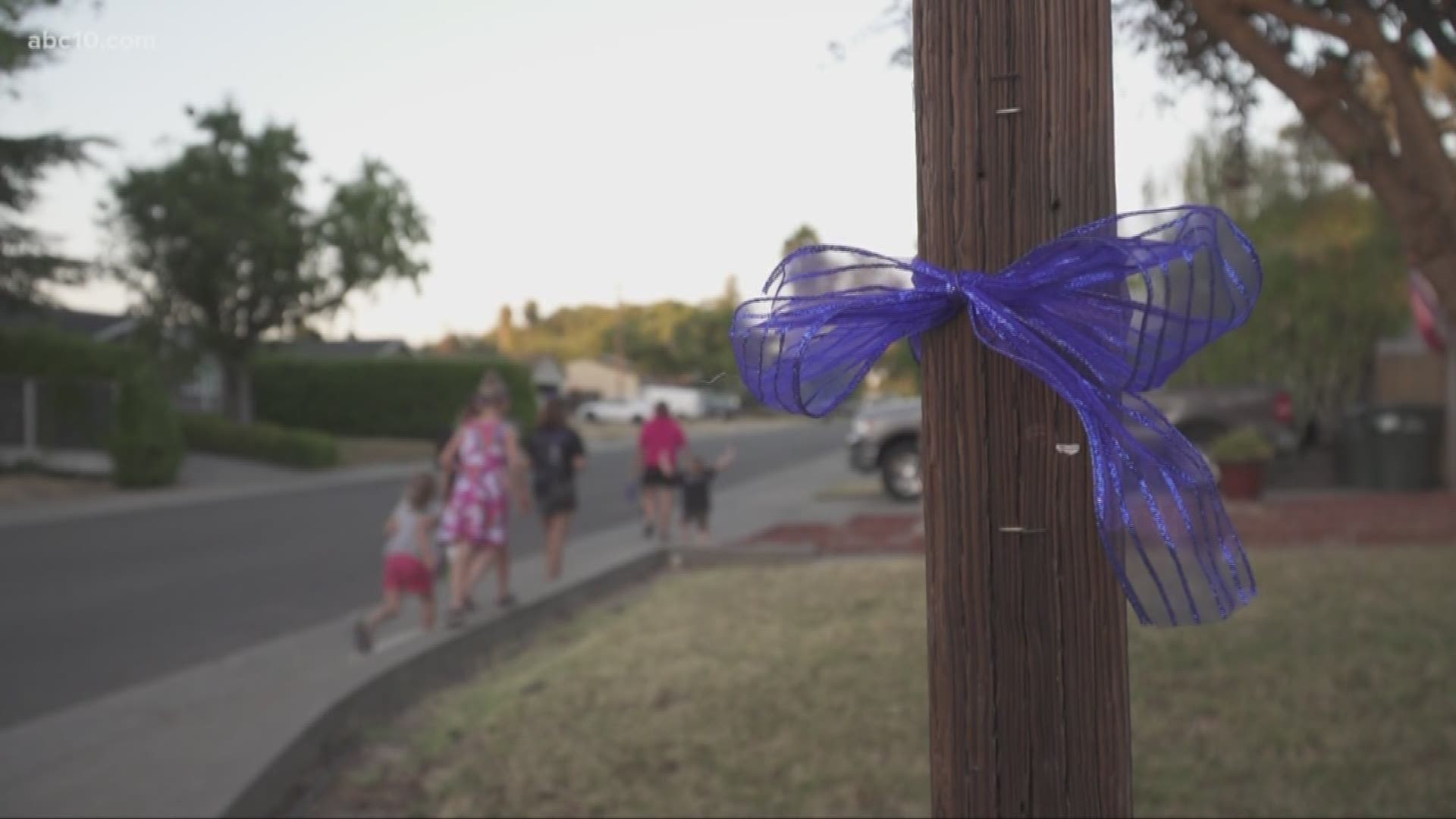 Family members of Sacramento County Sheriff's Deputies remembered Deputy Mark Stasyuk by placing blue ribbons in a neighborhood in Orangevale.