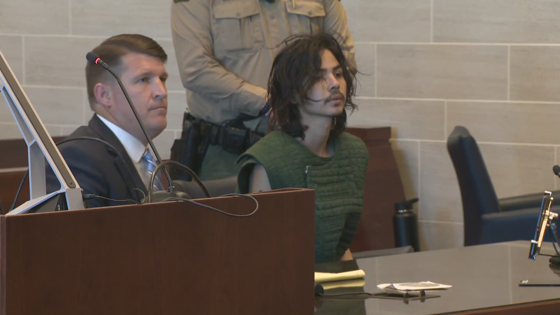 Carlos Dominguez, the man accused of stabbing three people in Davis and killing two of them, appeared in court Tuesday.