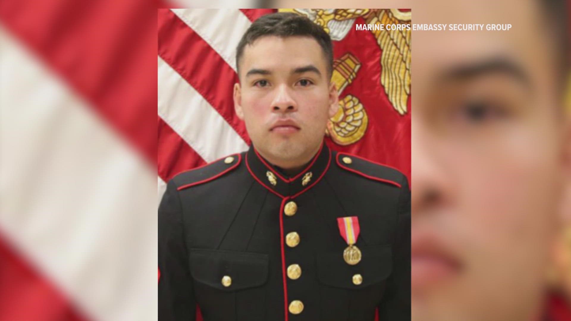 A cause of death has not been released, but officials with Marine Corps Embassy Security Group say an investigation is underway.