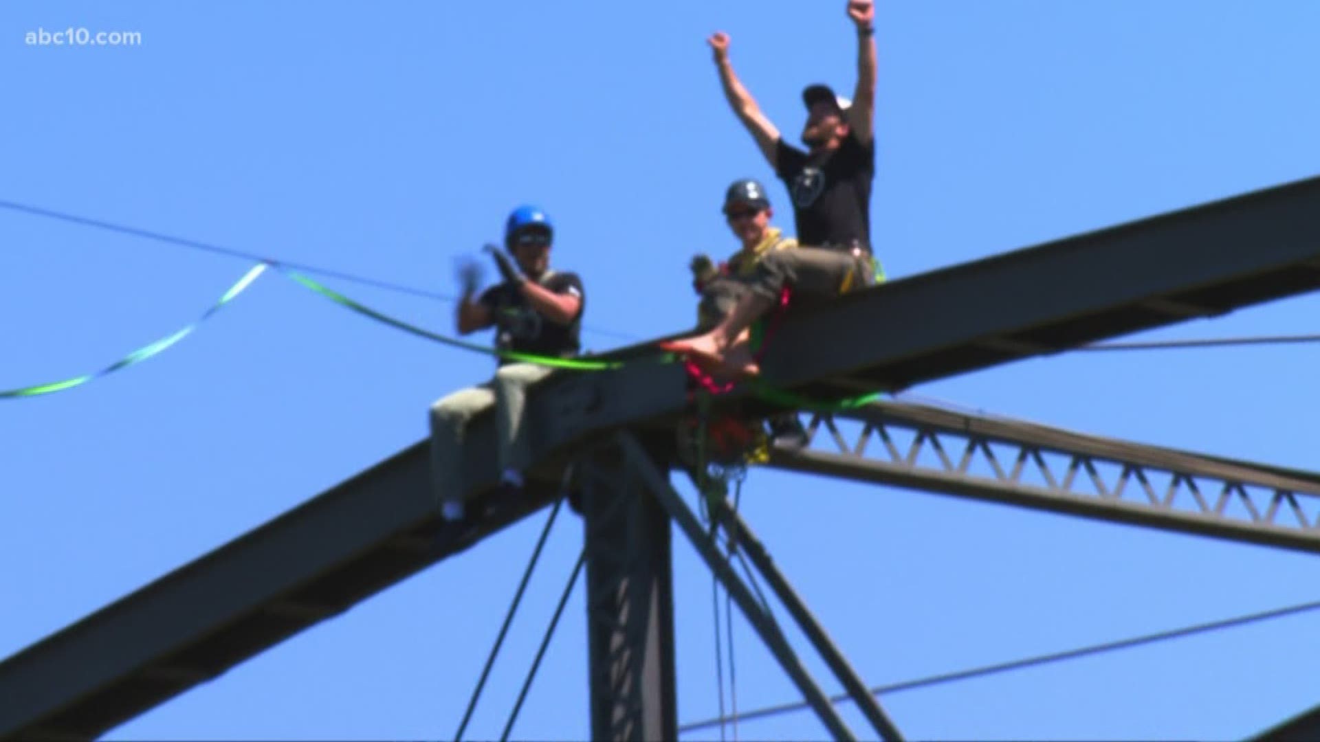 ABC10's Jeremy Flint was there as Folsom native Ryan Robinson complete a 1,919-foot slackline walk across the American River. Robinson slacklined from Natomas Crossing to top of the City's Historic Truss Bridge.