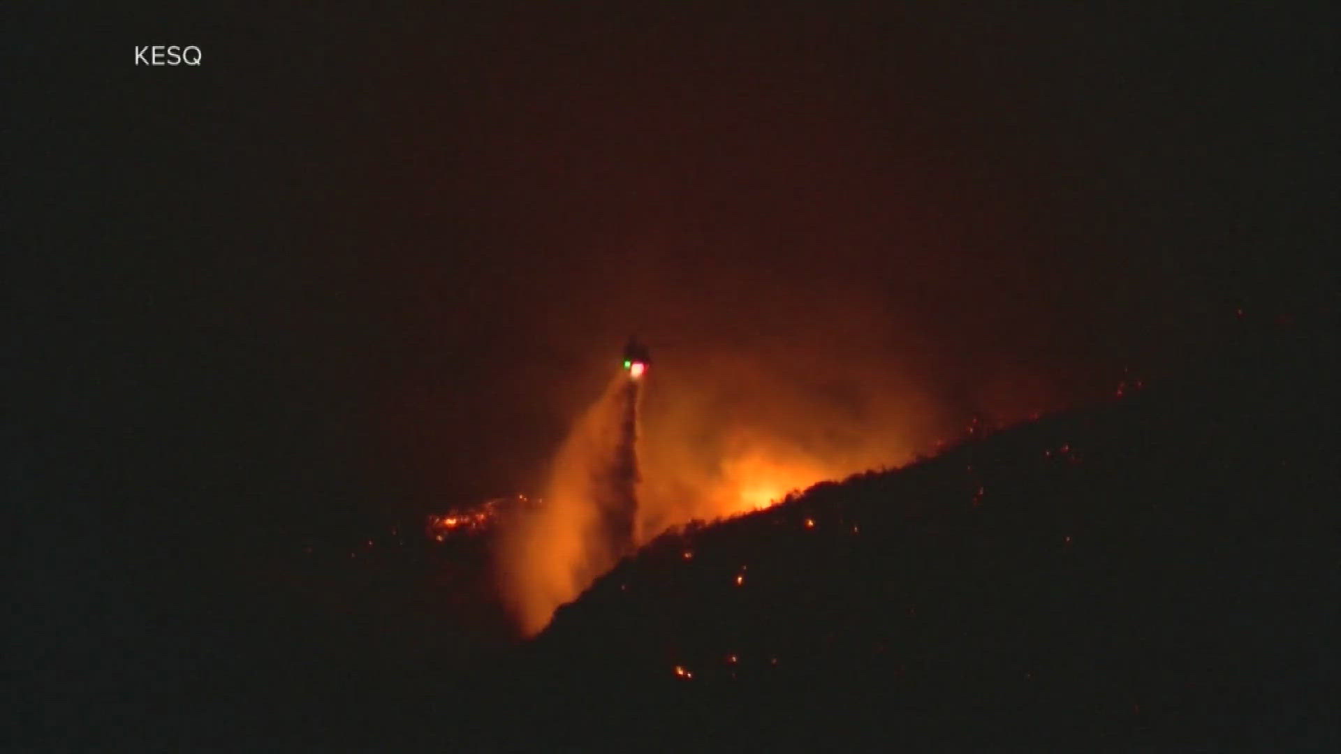 Firefighters battling three major wildfires in the mountains east of Los Angeles took advantage of cooler weather Wednesday as they slowly gained the upper hand.