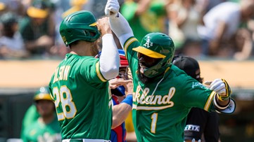 Olson, A's romp 12-3, hand Rangers 13th straight road loss