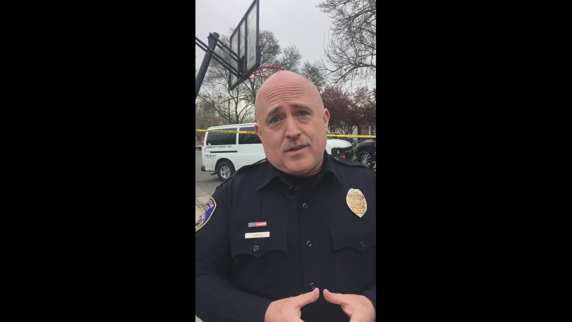 ‪Officer Joe Silva with Stockton Police Department talks about the triple homicide near F Street and Finland Avenue late Thursday night. Three people, two men and a woman, were killed in a shooting. Two were killed in a car, another was taken to the hospital in critical condition where he later died.
